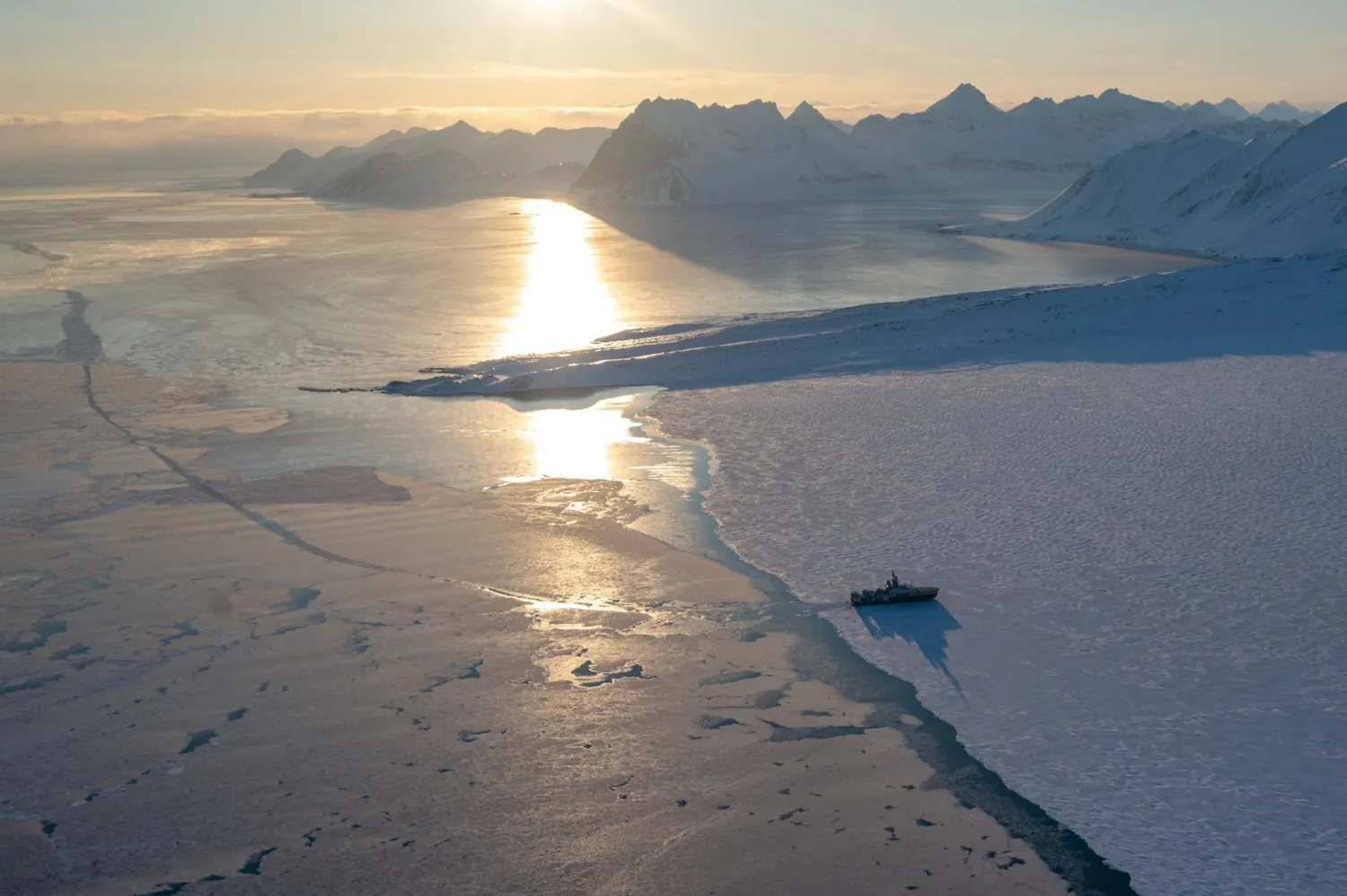 (FILES) This photograph shows the scientific ice-going "Kronprins Haakon" sailing through the sea ice in eastern Spitzbergen, in the Svalbard archipelago, on April 10, 2025.  (Photo by Olivier MORIN / AFP)