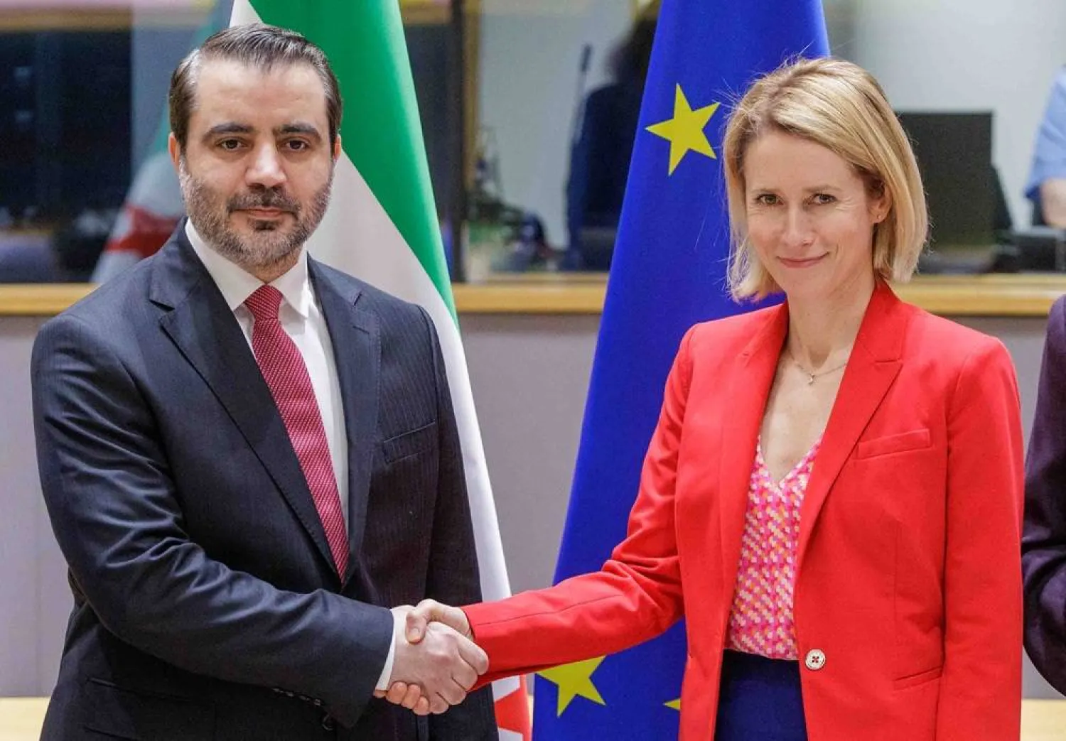 Asaad al-Shaibani (L), Minister for Foreign Affairs and Expatriates of the Syrian transitional government, shakes hand with Kaja Kallas, European High Representative of the Union for Foreign Affairs, at the first EU-Syria High-level Political Dialogue in Brussels, Belgium, 11 May 2026. (EPA)