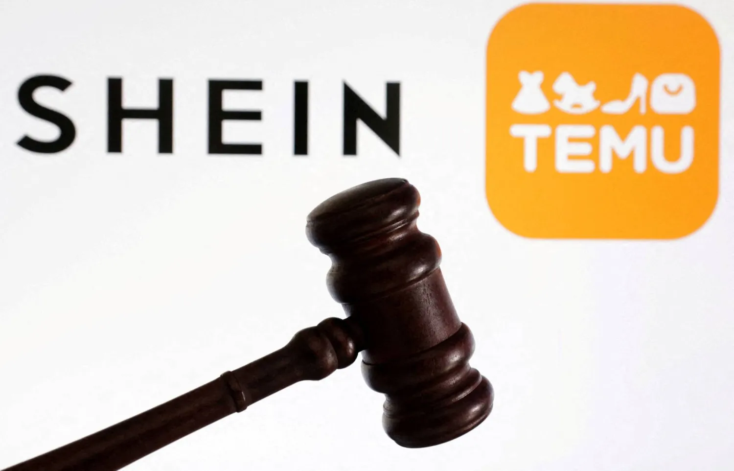 FILE PHOTO: Shein and Temu logos are seen in this illustration taken August 22, 2024. REUTERS/Dado Ruvic/Illustration/File Photo
