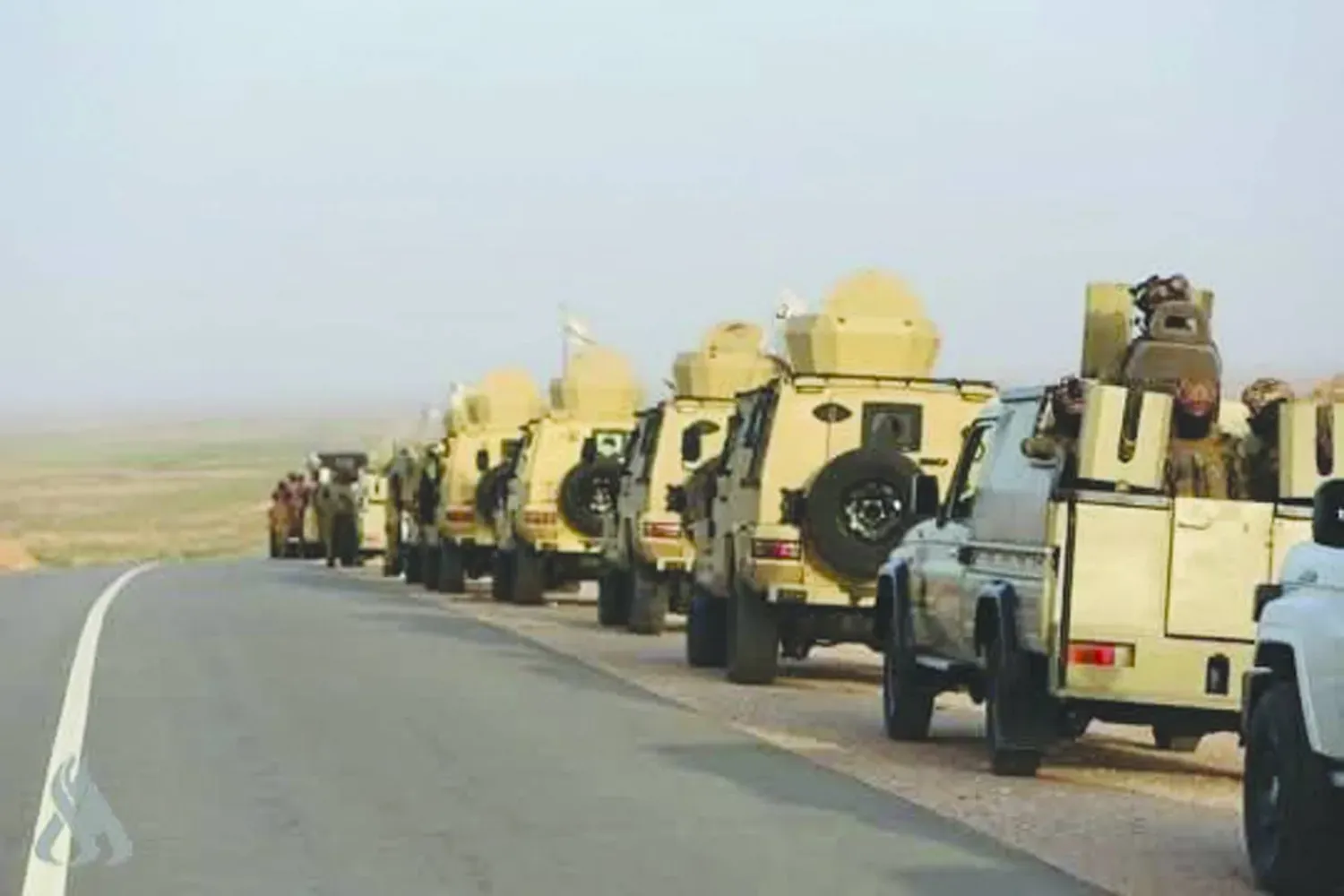 Dün Irak'ın güneyindeki Kerbela çölünde "egemenliğin tesis edilmesi" operasyonu sırasında Halk Seferberlik Güçleri'ne bağlı bir birlik (Örgütün internet sitesi)