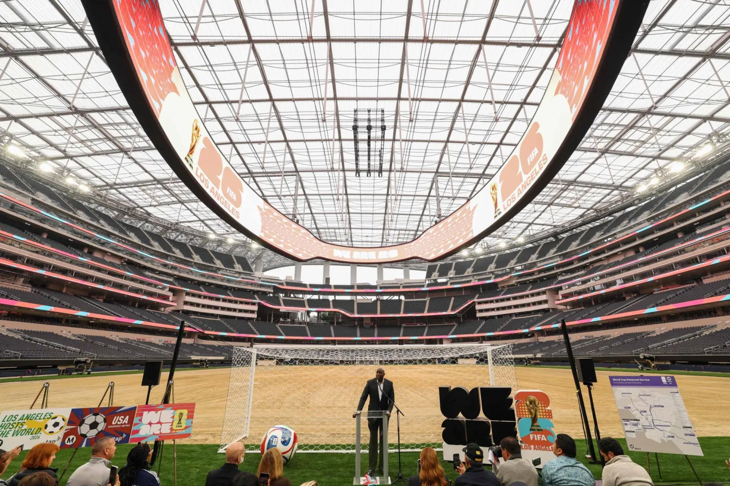 Earvin “Magic” Johnson, Los Angeles World Cup 2026 Community Ambassador, speaks during the 30 Days to FIFA World Cup 2026 media event at SoFI Stadium before the pitch installation and temporary renaming to Los Angeles Stadium in Inglewood, California on May 12, 2026. (Photo by Patrick T. Fallon / AFP)