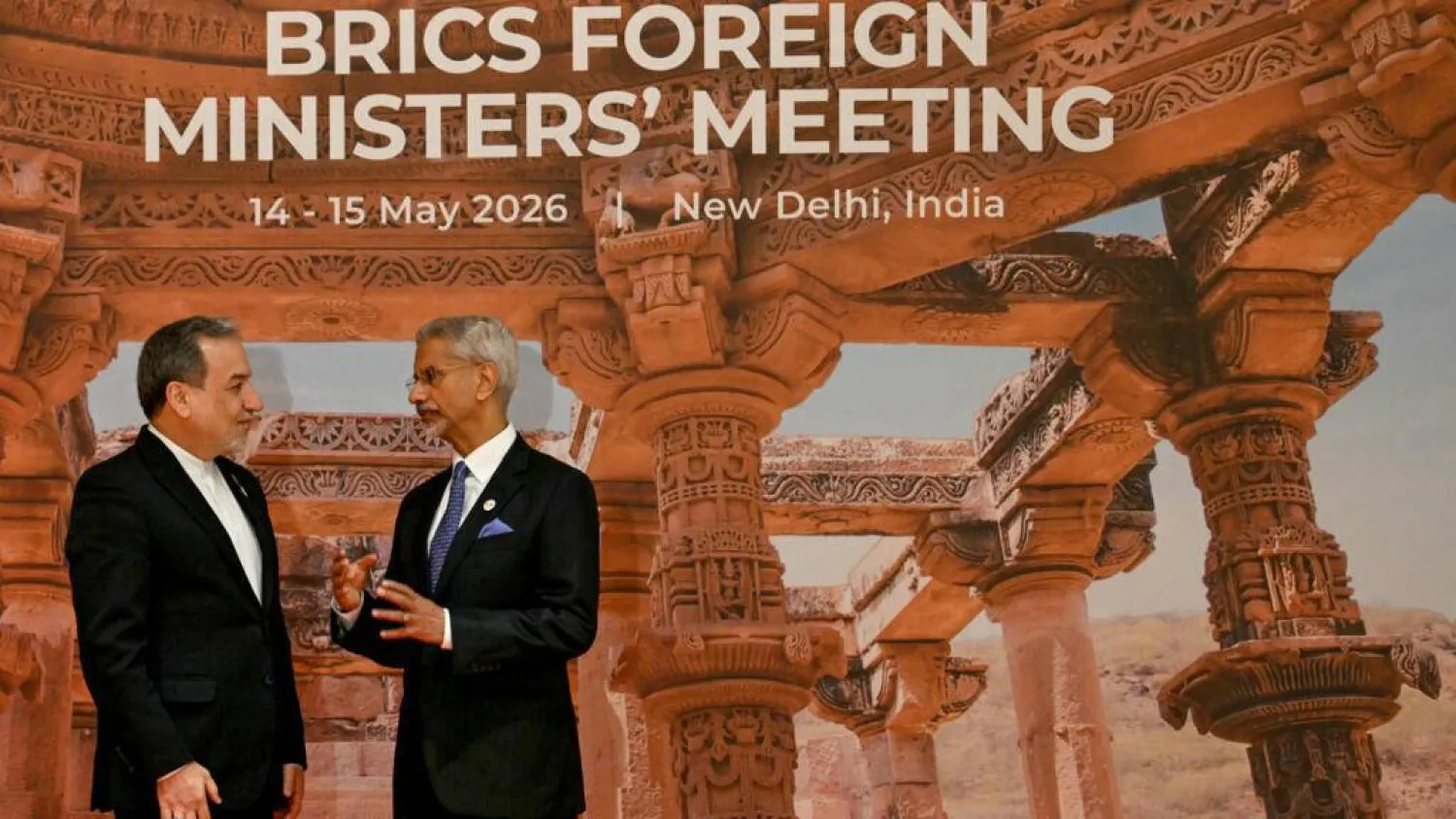 India's Foreign Minister Subrahmanyam Jaishankar (R) speaks to Iranian counterpart Abbas Araghchi at the opening of the BRICS Foreign Ministers’ Meeting in New Delhi. Arun SANKAR / AFP