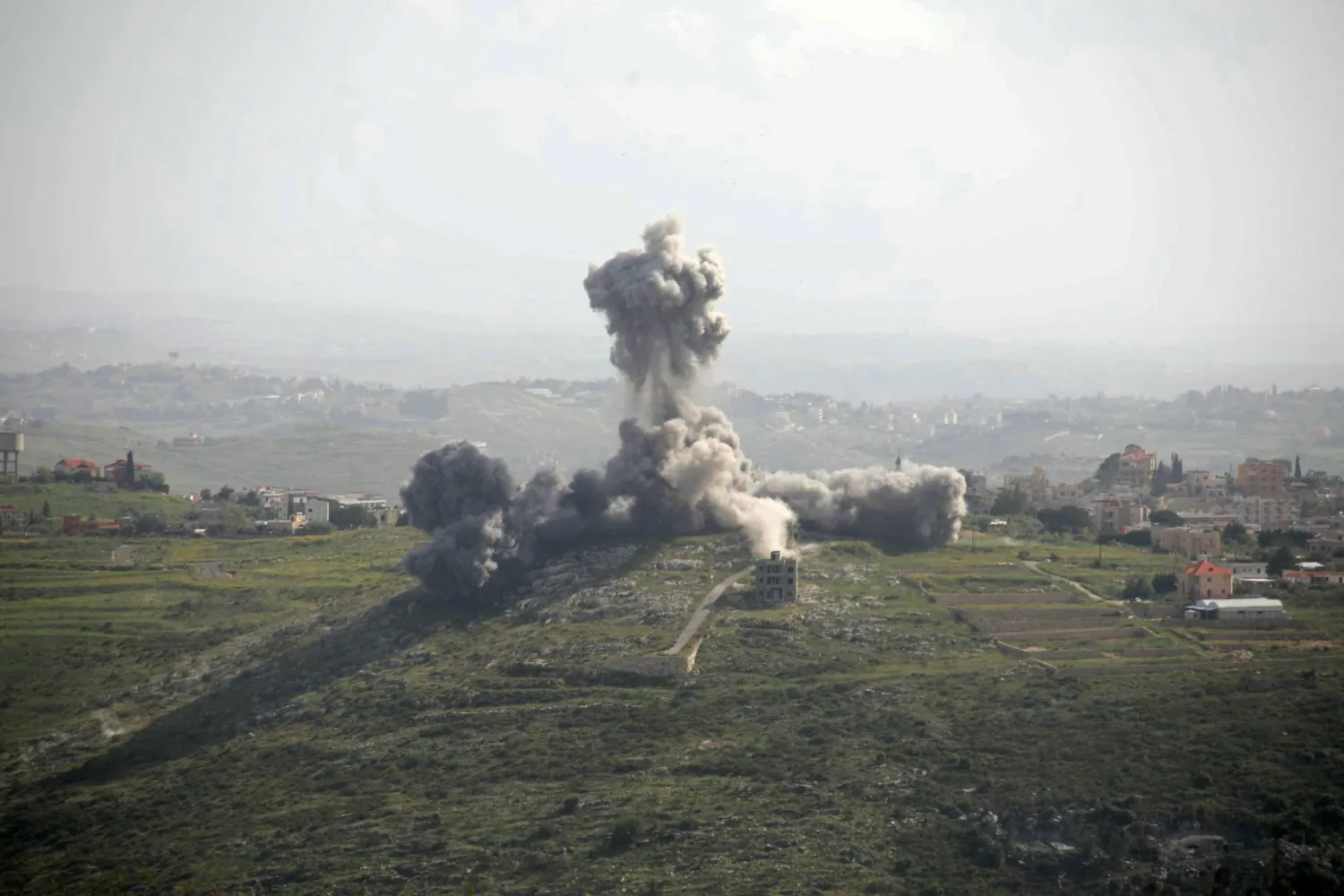 Smoke rises from the site of an Israeli airstrike that targeted the southern Lebanese village of Deir El Zahrani on May 13, 2026. (Photo by Kawnat HAJU / AFP)