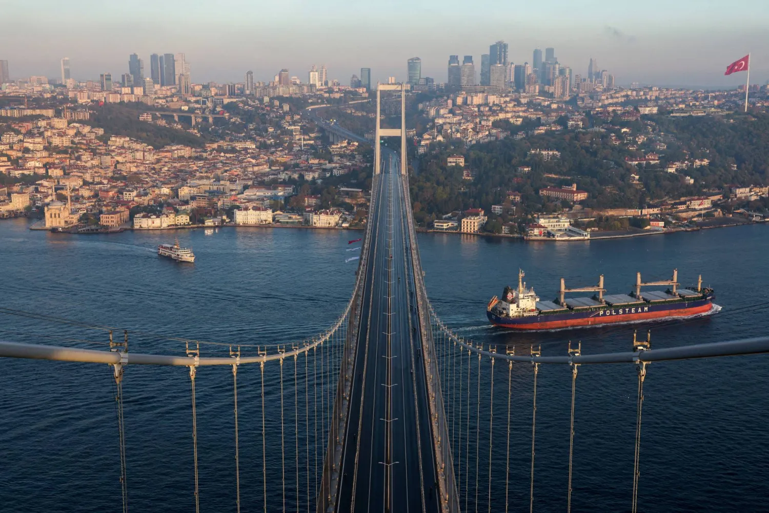 FILE PHOTO: A view of the city's business and financial districts, from the July 15 Martyrs' Bridge, known as the Bosphorus Bridge, which links the city's Asian and European sides, in Istanbul, Türkiye, November 2, 2025. REUTERS/Murad Sezer/File Photo