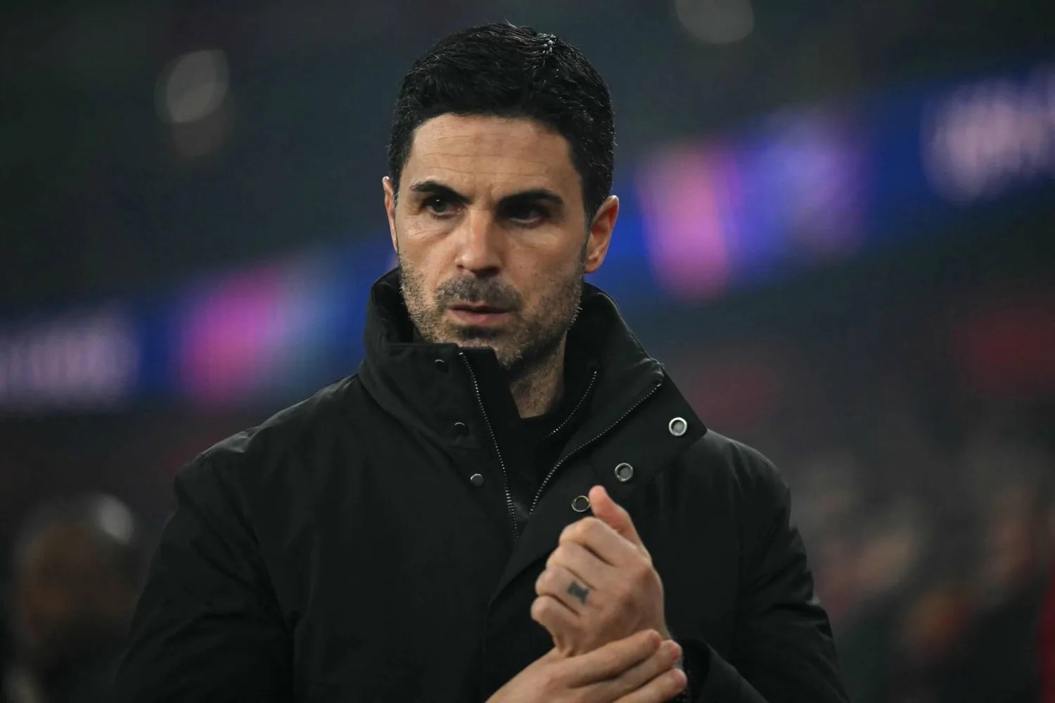 (FILES) Arsenal's Spanish manager Mikel Arteta arrives ahead of kick-off in the UEFA Champions League, last 16 second leg football match between Arsenal and Bayer Leverkusen at the Emirates Stadium in north London on March 17, 2026. (Photo by Glyn KIRK / AFP)