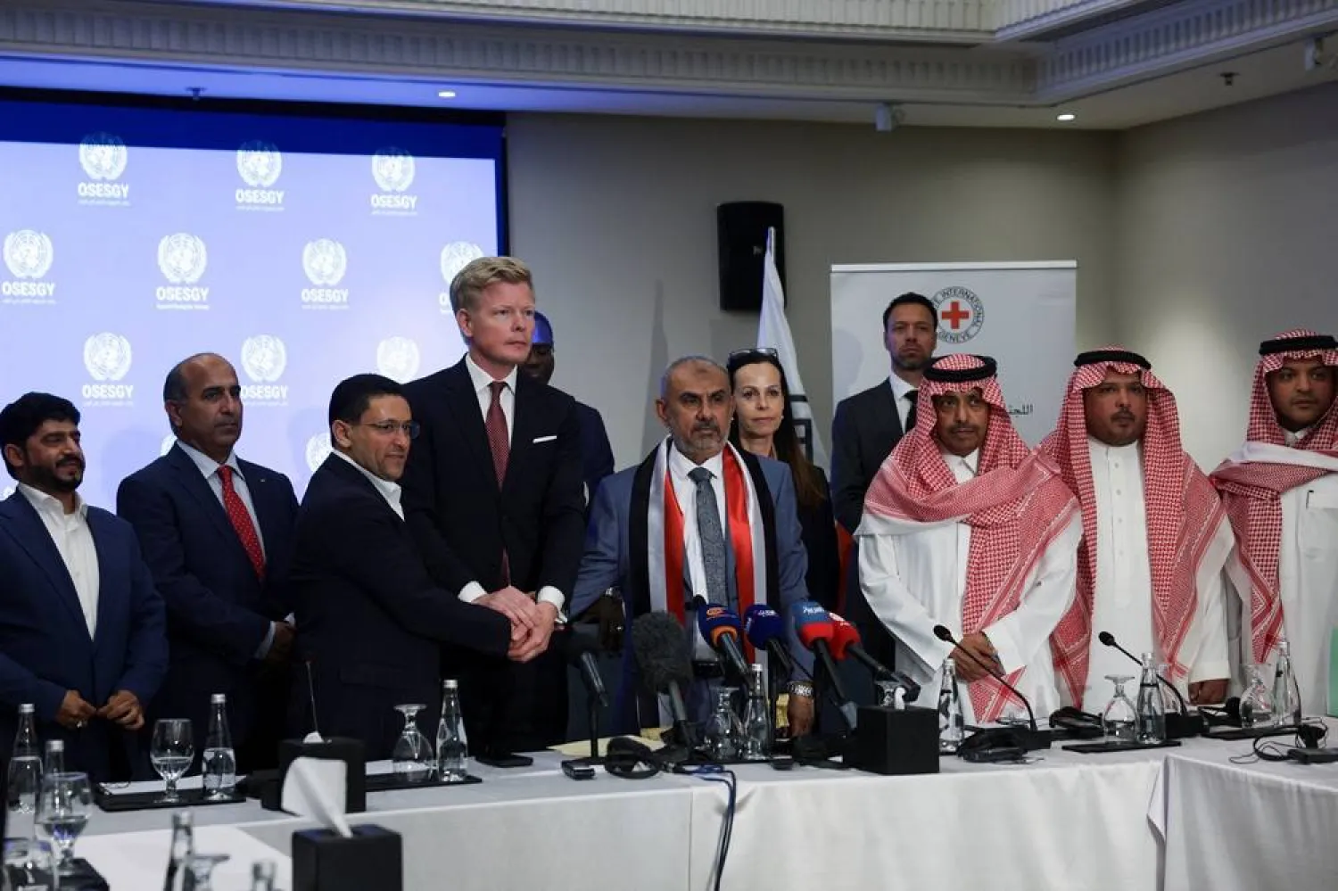 Hans Grundberg, UN Special Envoy for Yemen, poses for a photo as members of the Supervisory Committee on the Detainees Release Agreement attend the closing ceremony of a meeting between the legitimate Yemeni government and the Houthis, in Amman, Jordan, May 14, 2026. (Reuters) 