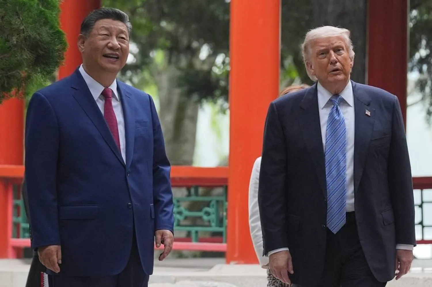  President Donald Trump talks with China's President Xi Jinping at the Zhongnanhai leadership compound, Friday, May 15, 2026, in Beijing. (AP Photo/Mark Schiefelbein, Pool) 