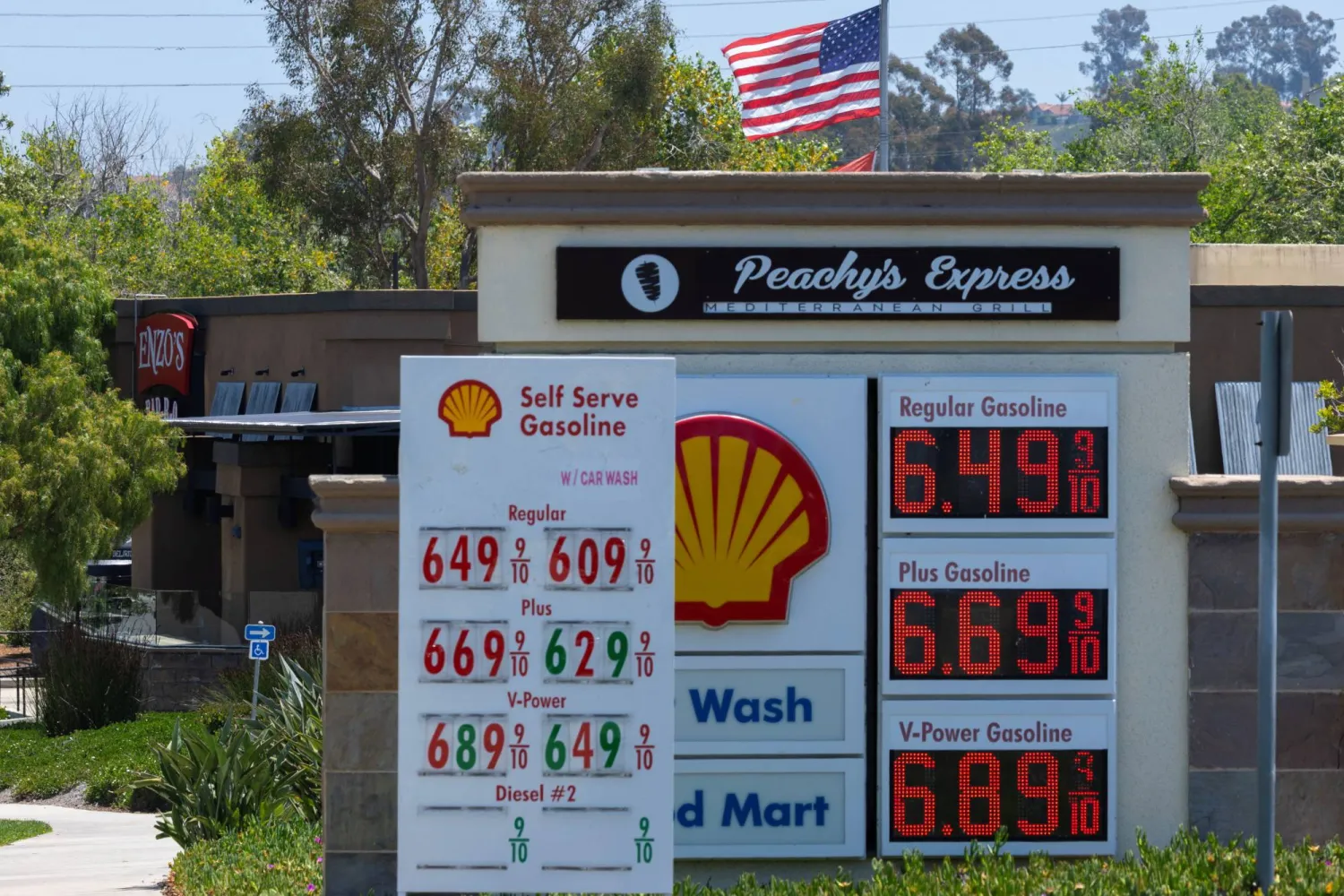 The current price of gasoline is shown at a gas station in Encinitas, California, US, May 11, 2026.  REUTERS/Mike Blake