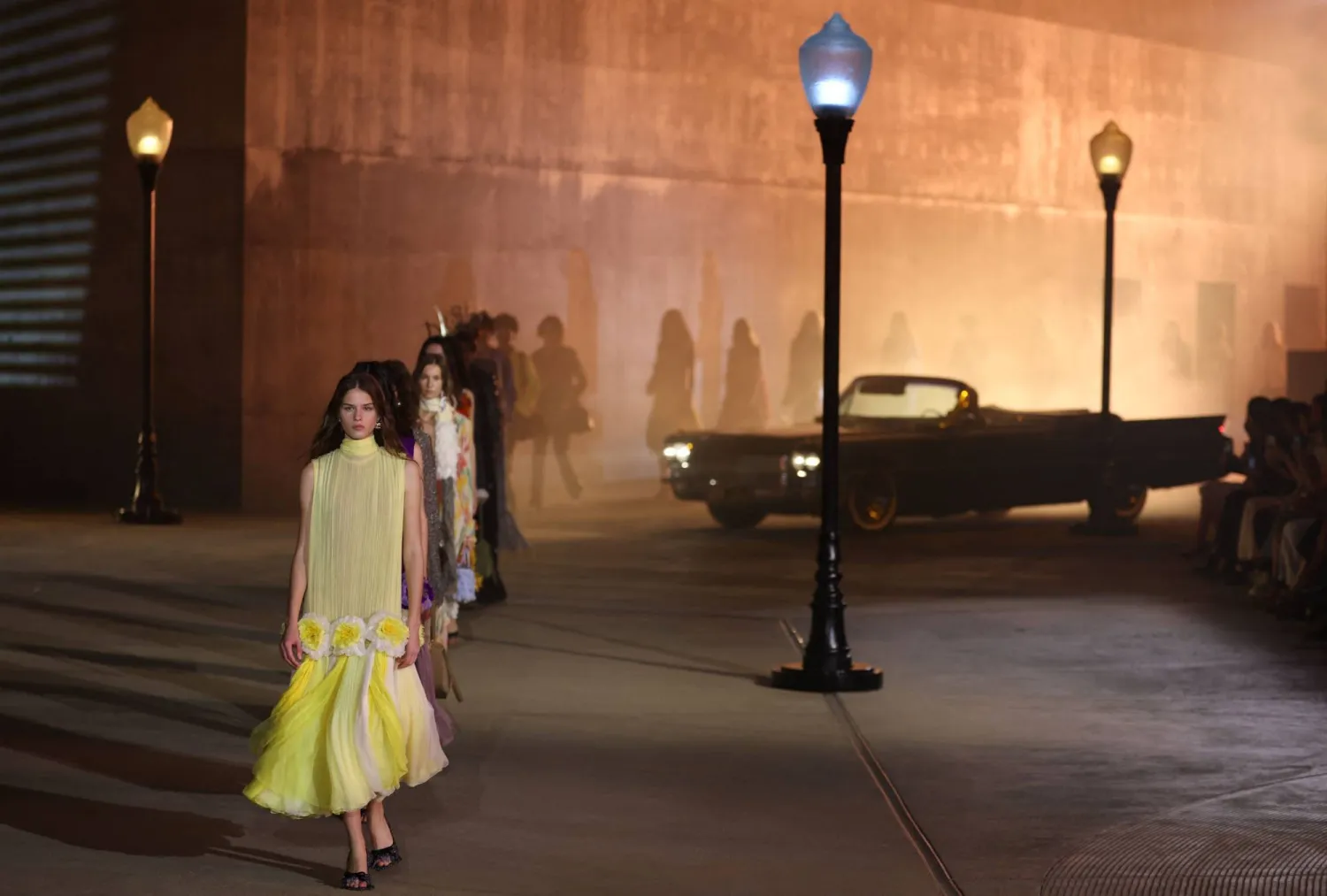 Models walk the runway during the Dior 2027 Cruise collection fashion show at the Los Angeles County Museum of Art (LACMA) in Los Angeles on May 13, 2026. (Photo by Patrick T. Fallon / AFP)
