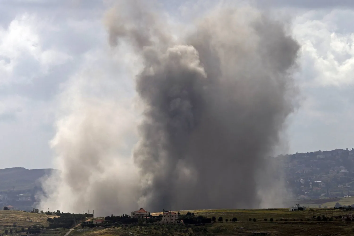 Smoke rises from the site of an Israeli airstrike that targeted the southern Lebanese village of Kfar Tibnit on May 15, 2026. (AFP)