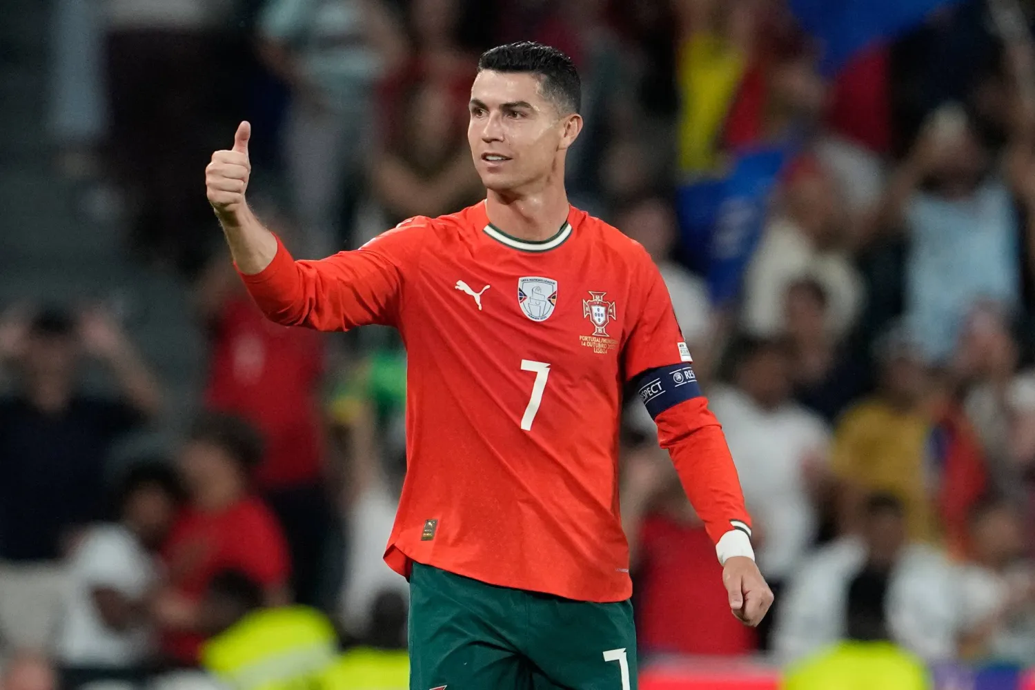 Portugal's Cristiano Ronaldo celebrates after scoring during a World Cup 2026 group F qualifying soccer match between Portugal and Hungary in Lisbon, Oct. 14, 2025. (AP)