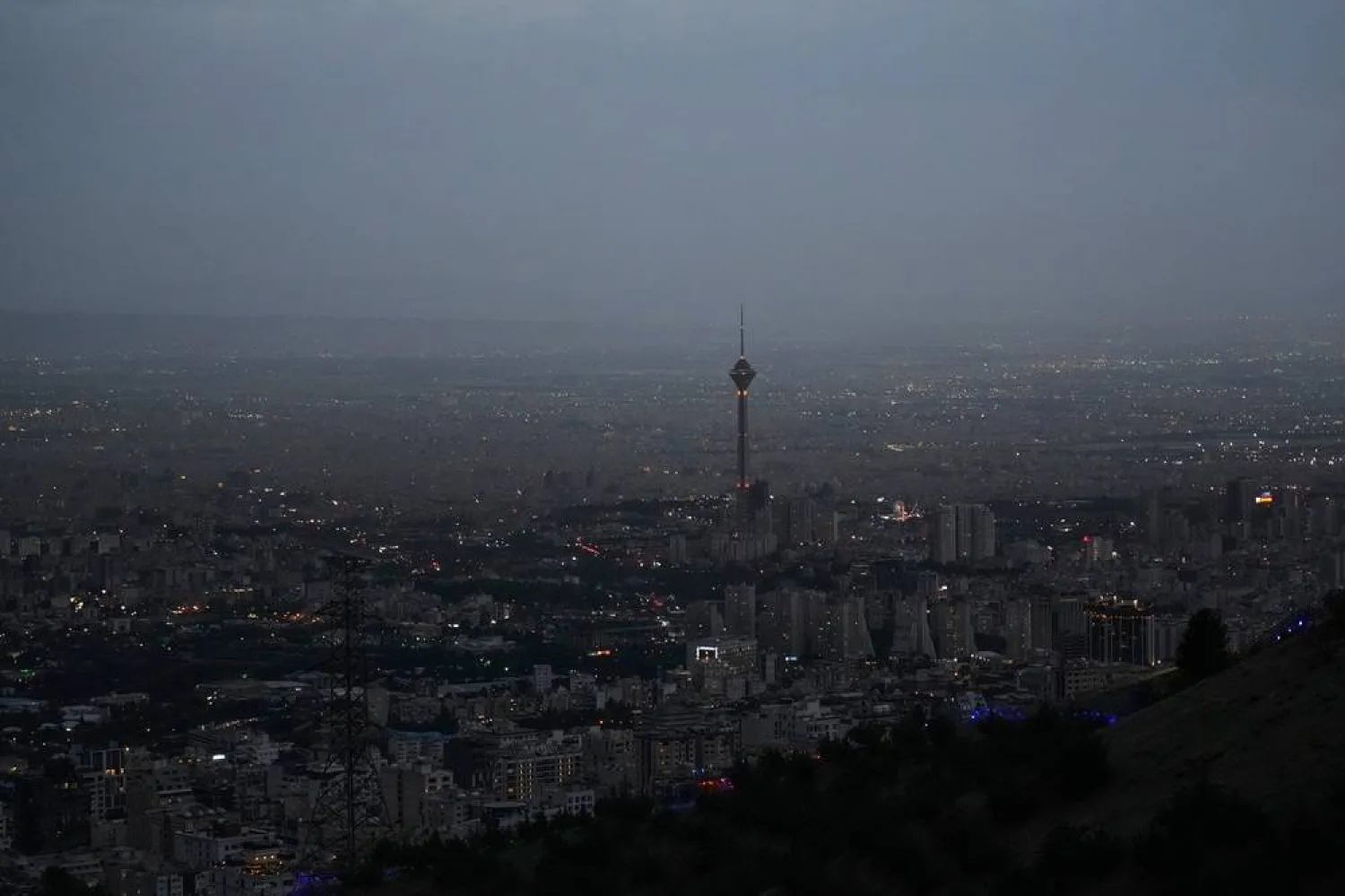  Night falls over the city and the Milad Tower in Tehran, Iran, Friday, May 15, 2026. (AP)