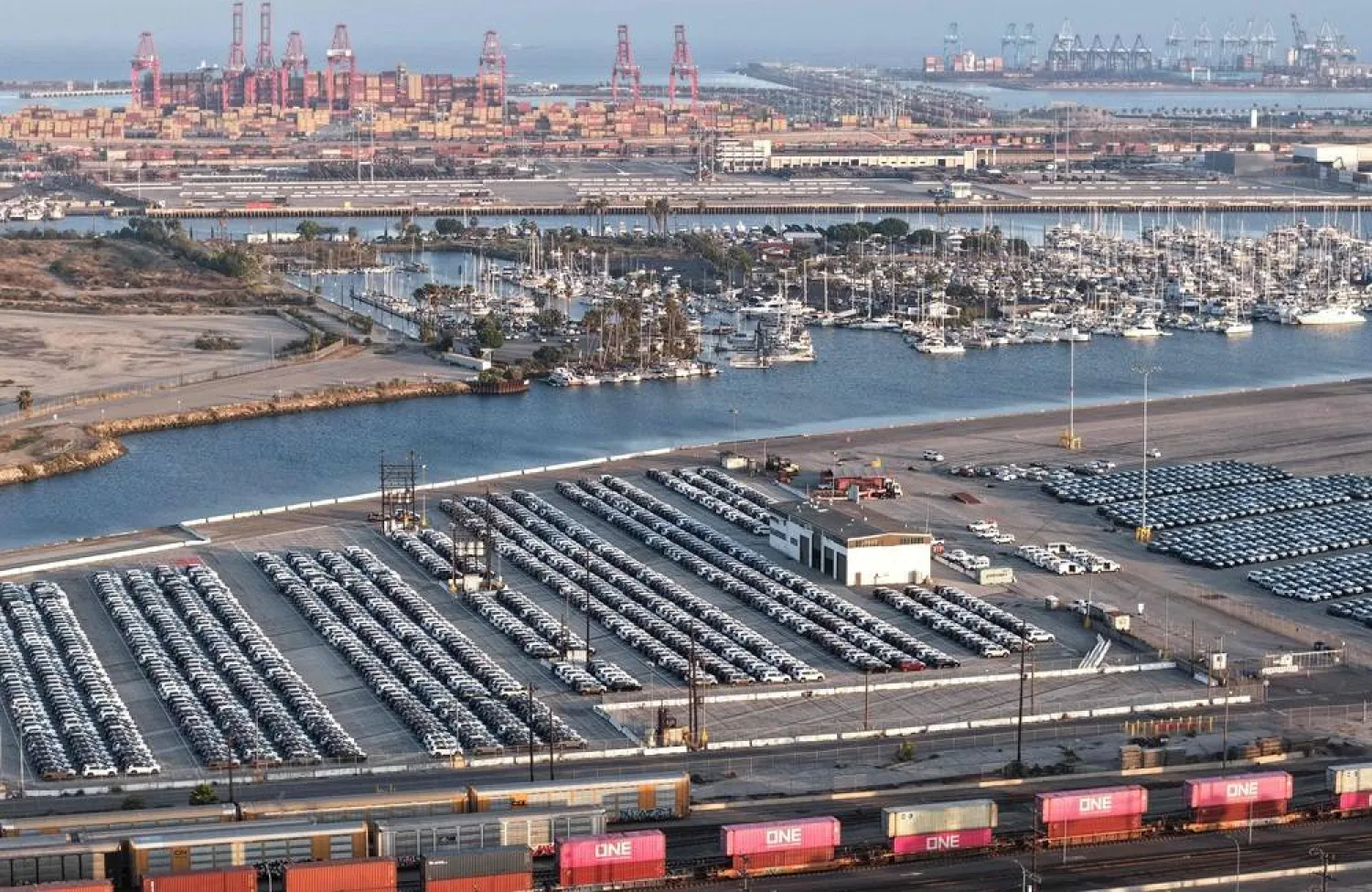 An aerial view of newly imported cars parked at the automobile terminal at the Port of Los Angeles on May 08, 2026 in Wilmington, California. (Getty Images/AFP)