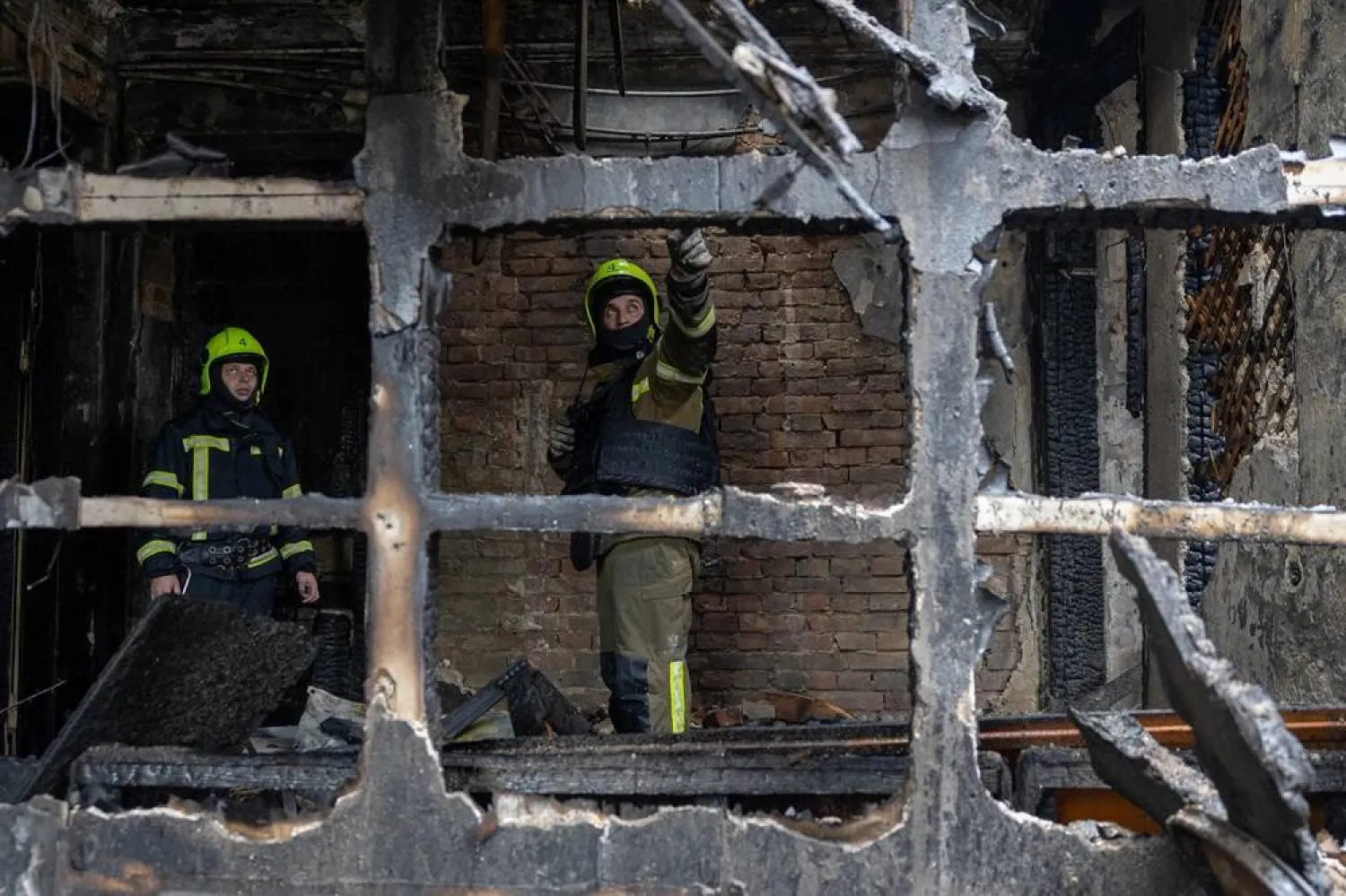 Ukrainian rescuers work at the site of an air attack in Odesa on May 18, 2026, amid the Russian invasion in Ukraine. (AFP)