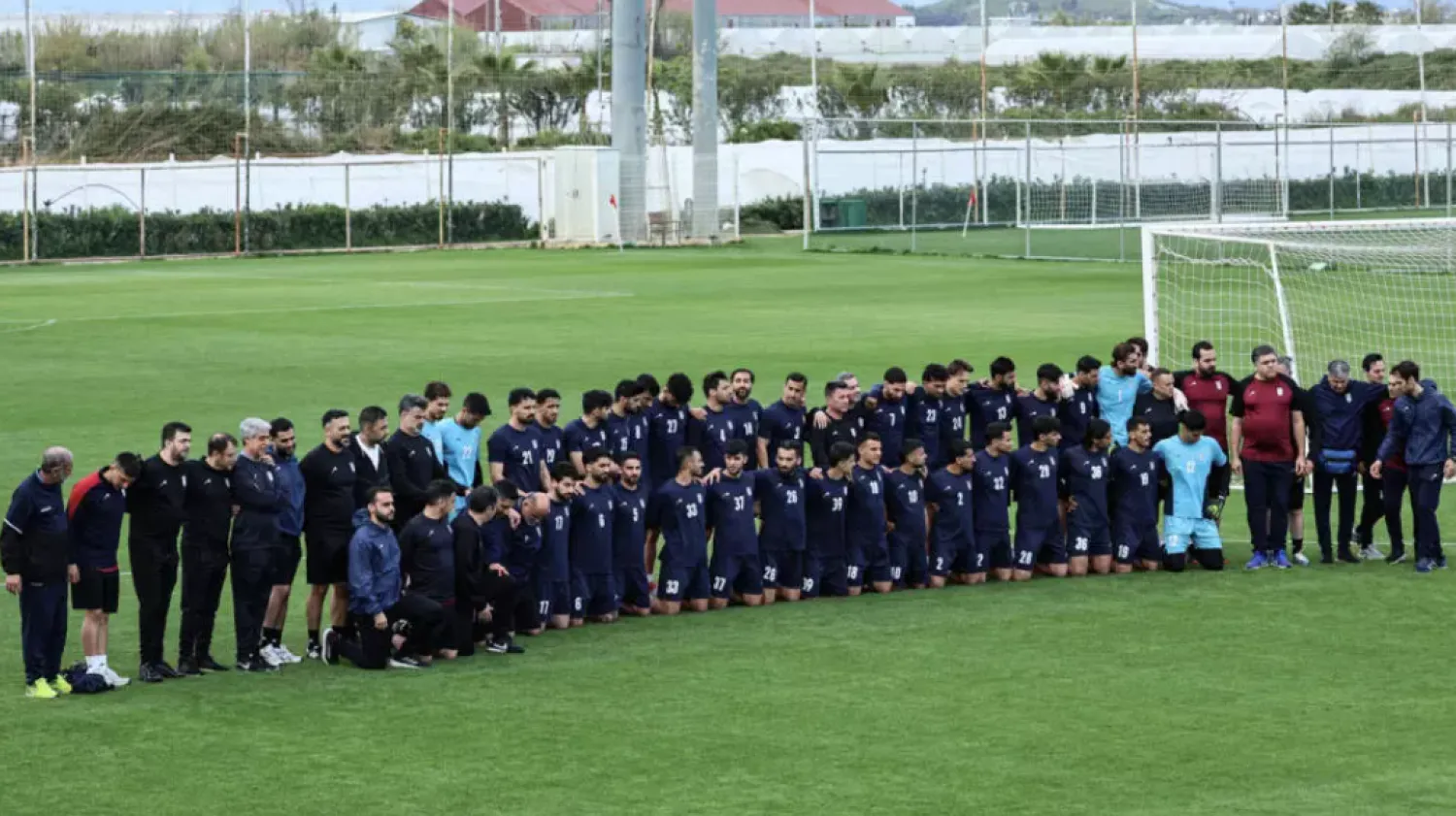 Iran's players and staff pose ahead of a training session in Antalya in March © Adem ALTAN / AFP/File
