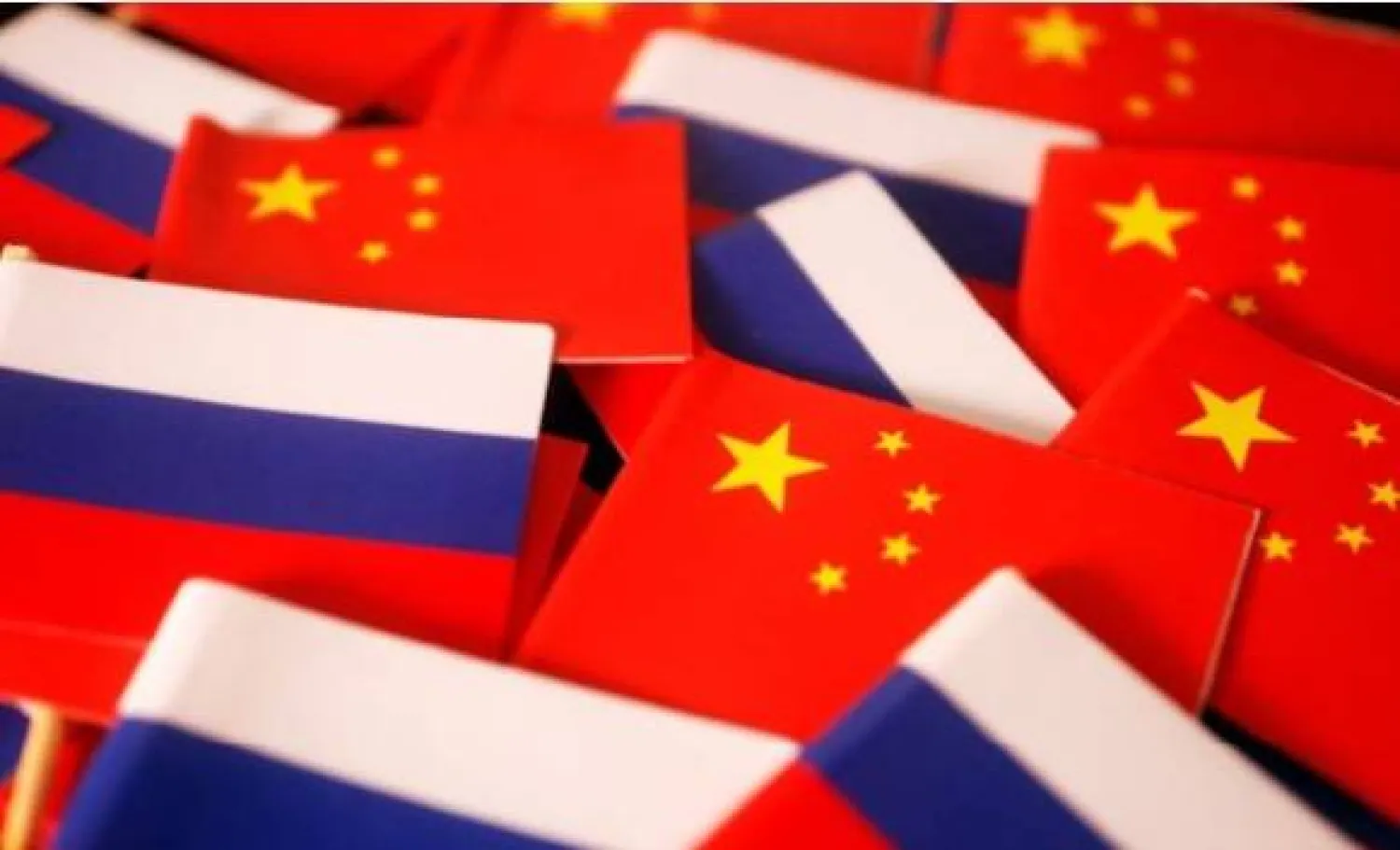 Flags of China and Russia are displayed in this illustration picture taken March 24, 2022. REUTERS/Florence Lo/Illustration Purchase Licensing Rights