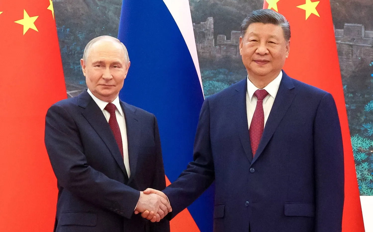  Russian President Vladimir Putin and Chinese President Xi Jinping pose for a picture during a meeting at the Great Hall of the People in Beijing, China May 20, 2026. (Sputnik/Maxim Stulov/Pool via Reuters)