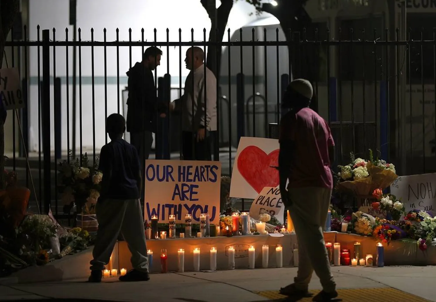 A tribute of candles is placed in front of the center's gates following a vigil at the Islamic Center of San Diego in San Diego, California, USA, 19 May 2026. (EPA)