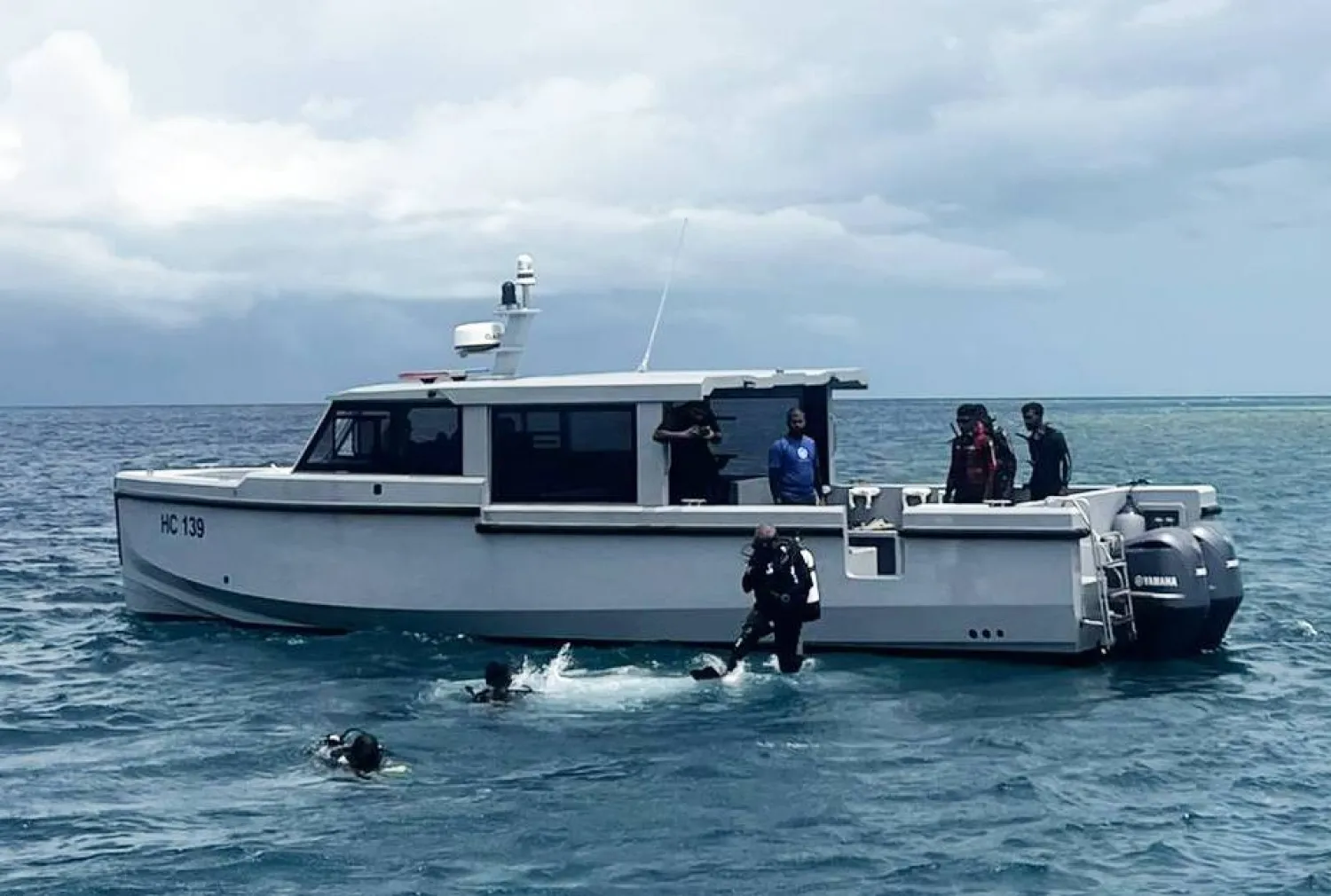 A handout photo made available by the Maldives President's Media Division shows divers conduct search and recovery operations for the remaining bodies of Italian tourists in the waters of Vaavu Atoll, Maldives, 20 May 2026. EPA/Maldives President's Media Division Handout 