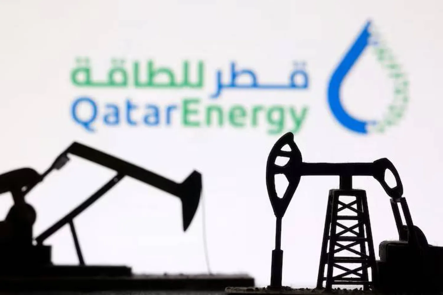 3D-printed oil pump jacks and the QatarEnergy logo appear in this illustration taken March 2, 2026. REUTERS/Dado Ruvic/Illustration
