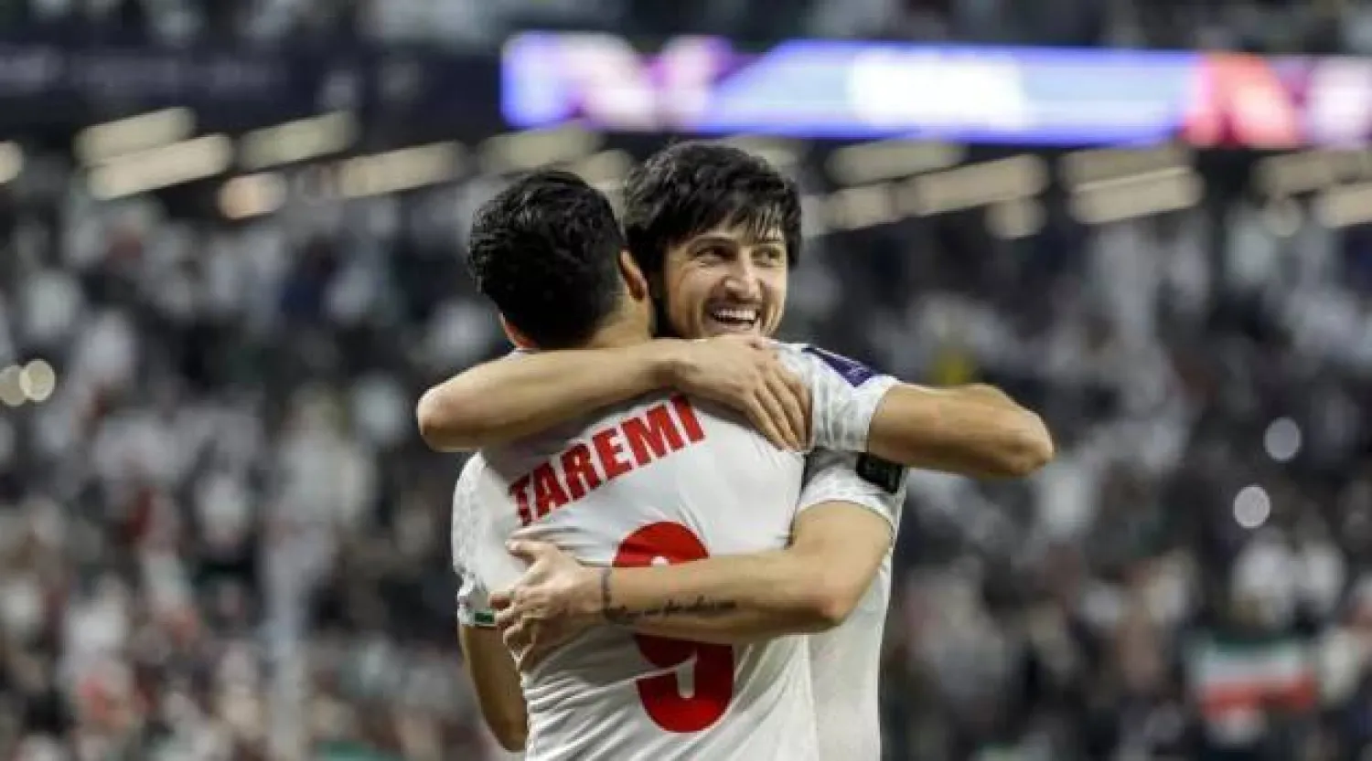 آزمون وطارمي في مباراة إيران وقطر ضمن كأس آسيا (أ.ف.ب)