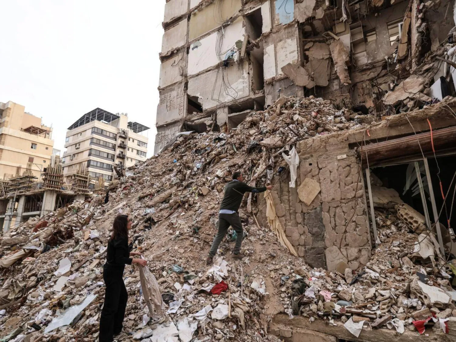 Ghida Krisht and Wael Sabbagh both lost relatives in an Israeli strikes. Anwar AMRO / AFP
