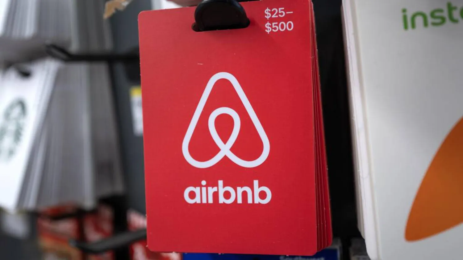 The rollout marks the latest step in Airbnb's push to capture more of the travel spending that currently flows to competitors like Booking.com and Expedia. SCOTT OLSON / GETTY IMAGES NORTH AMERICA/AFP