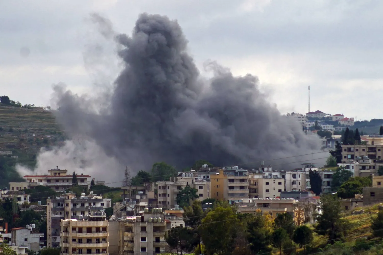 Smoke rises from the site of an Israeli strike that targeted the Nabatieh village in southern Lebanon on May 22, 2026. (AFP) 