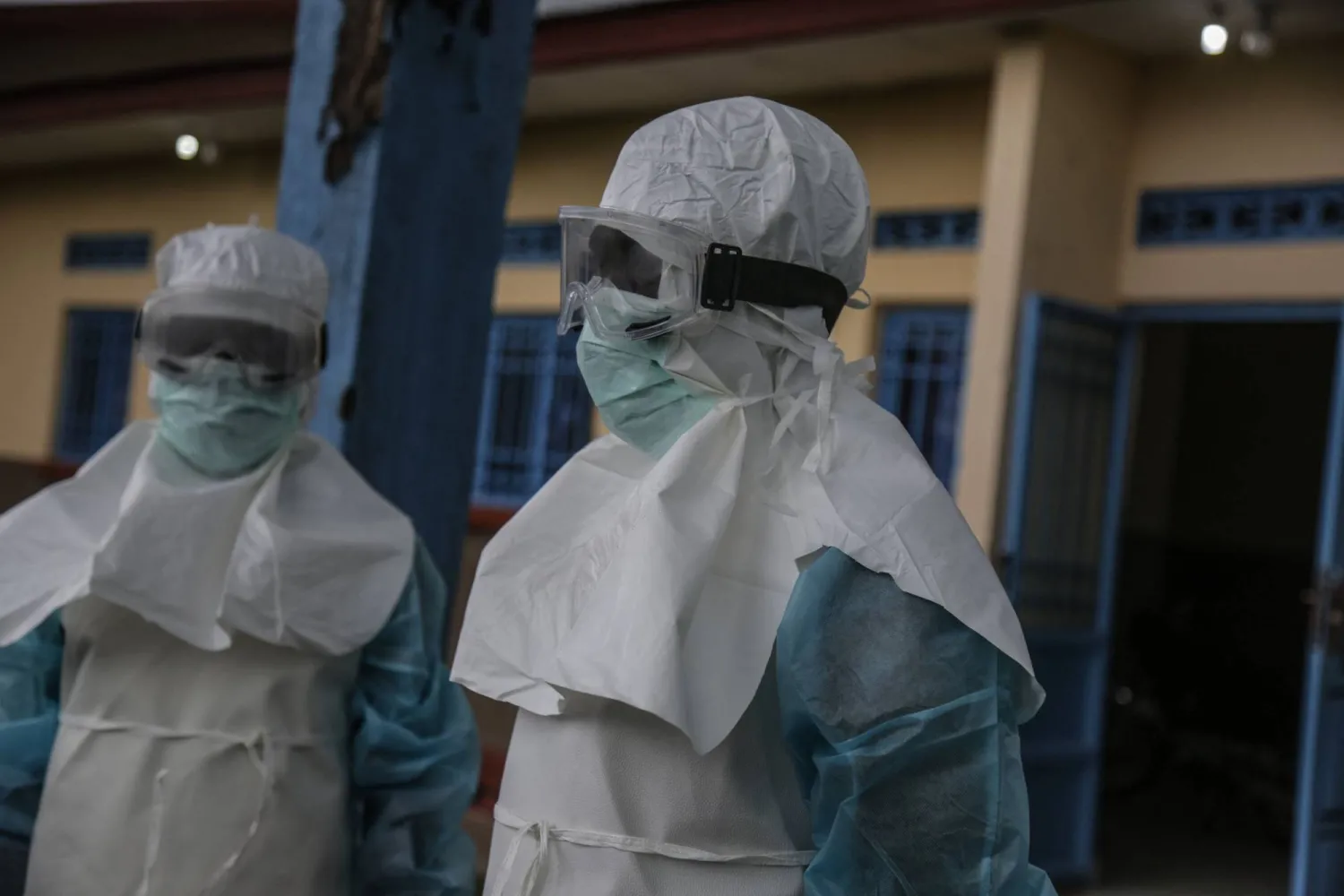 Medical staff wearing personal protective equipment (PPE) are seen at the hospital in Rwampara on May 21, 2026. (AFP)