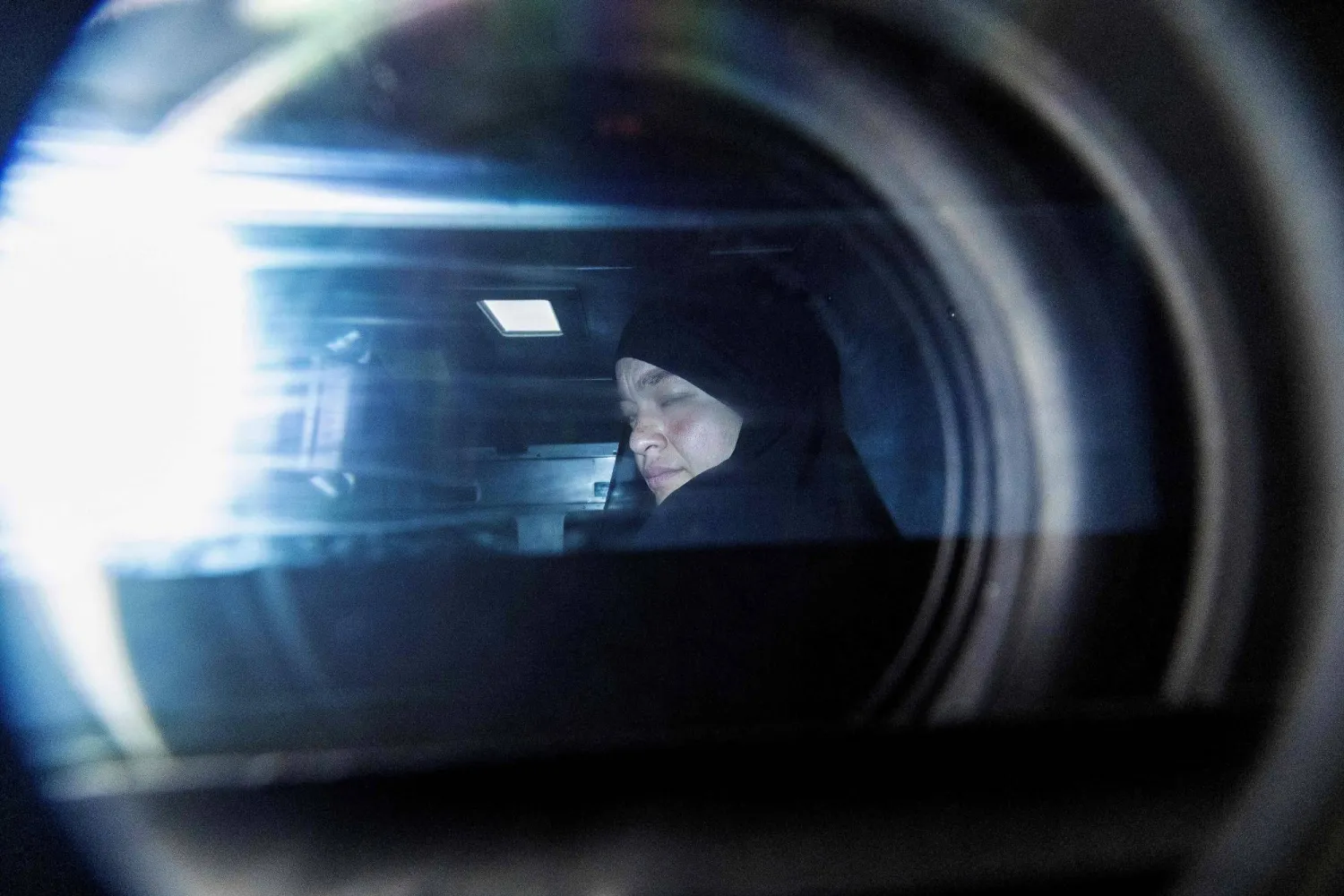 Zeinab Ahmad, one of two women linked to alleged ISIS militants, is seen being taken away in an armored police vehicle outside the Melbourne Magistrates’ Court in Melbourne on May 8, 2026, following her court appearance. (Photo by Martin KEEP / AFP)