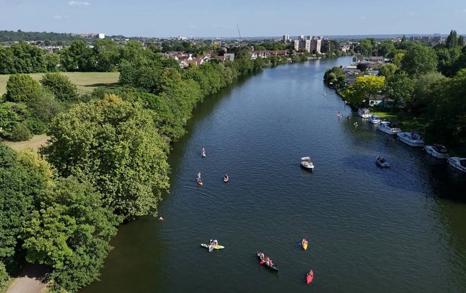 A drone view shows people using kayaks and paddle boards in the River Thames at Teddington Lock, London’s first official river bathing water site, as temperatures climb over the bank holiday weekend due to a heat dome spreading across the region, in London, Britain, May 24, 2026. (Reuters)