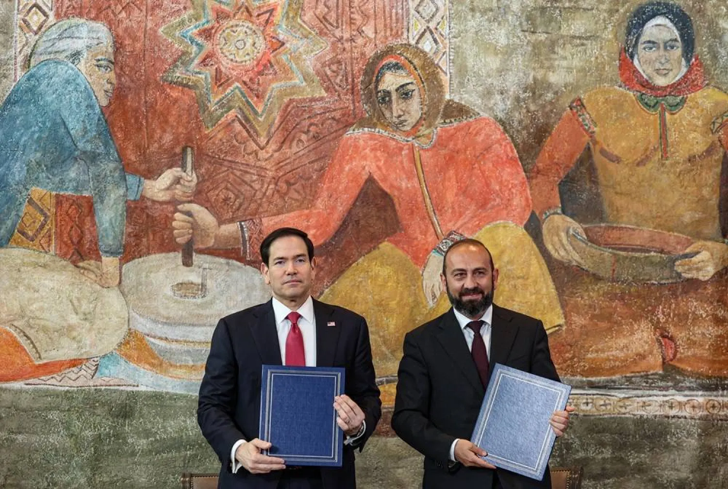 US Secretary of State Marco Rubio (L) and Armenian Foreign Minister Ararat Mirzoyan attend a signing ceremony during a meeting at Zvartnots International Airport in Yerevan, Armenia, 26 May 2026. (EPA)