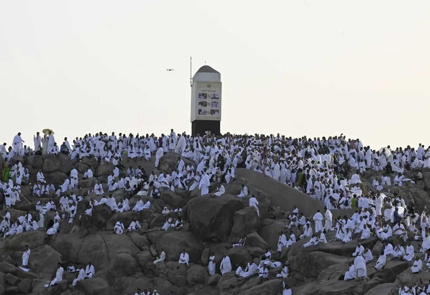 Muslim pilgrims gather at Jabal al-Rahmah (Mount of Mercy) in the Arafat region near Makkah, Saudi Arabia, 26 May 2026. (EPA)