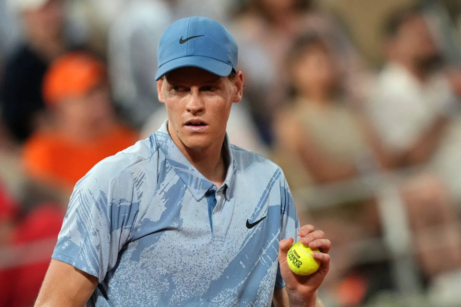 Italy's Jannik Sinner looks on as he plays against France's Clement Tabur during their men's singles match on day 3 of the French Open tennis tournament on Court Philippe-Chatrier at the Roland-Garros Complex in Paris on May 26, 2026. (Photo by Dimitar DILKOFF / AFP)