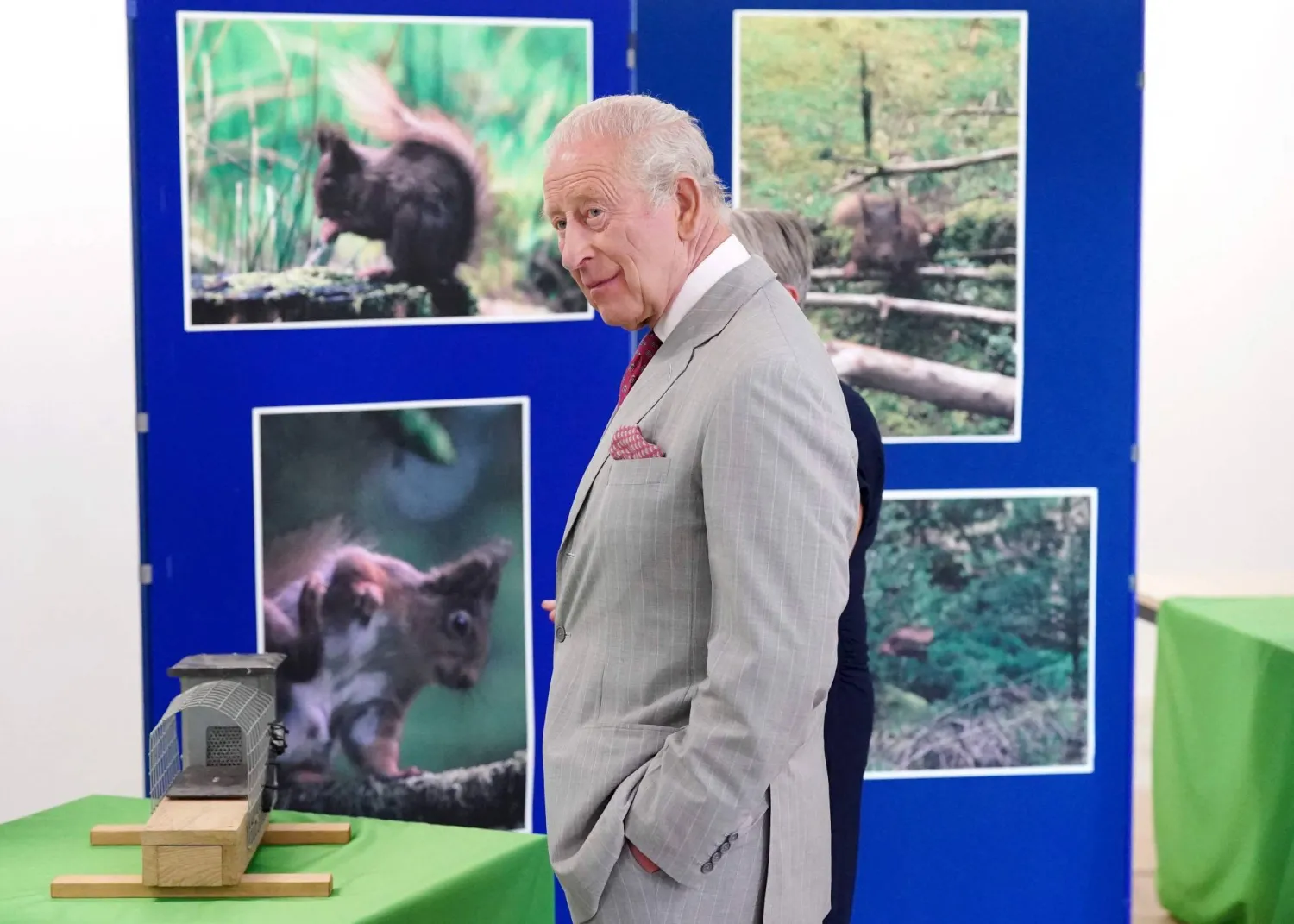 Britain's King Charles III smiles as he visits a conservation initiative to humanely control grey squirrel numbers, at the Animal and Plant Health Agency, in Sand Hutton, North Yorkshire, north-east England, on May 26, 2026. (Photo by Dominic Lipinski / POOL / AFP)