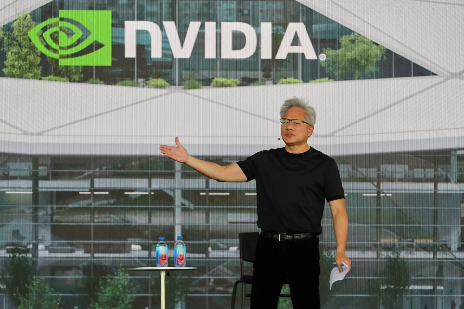 Nvidia CEO Jensen Huang delivers a speech during an all employee celebration at the construction site of their Taiwan headquarters "Constellation" in Taipei, Taiwan, Wednesday, May 27, 2026. (AP Photo/Chiang Ying-ying)