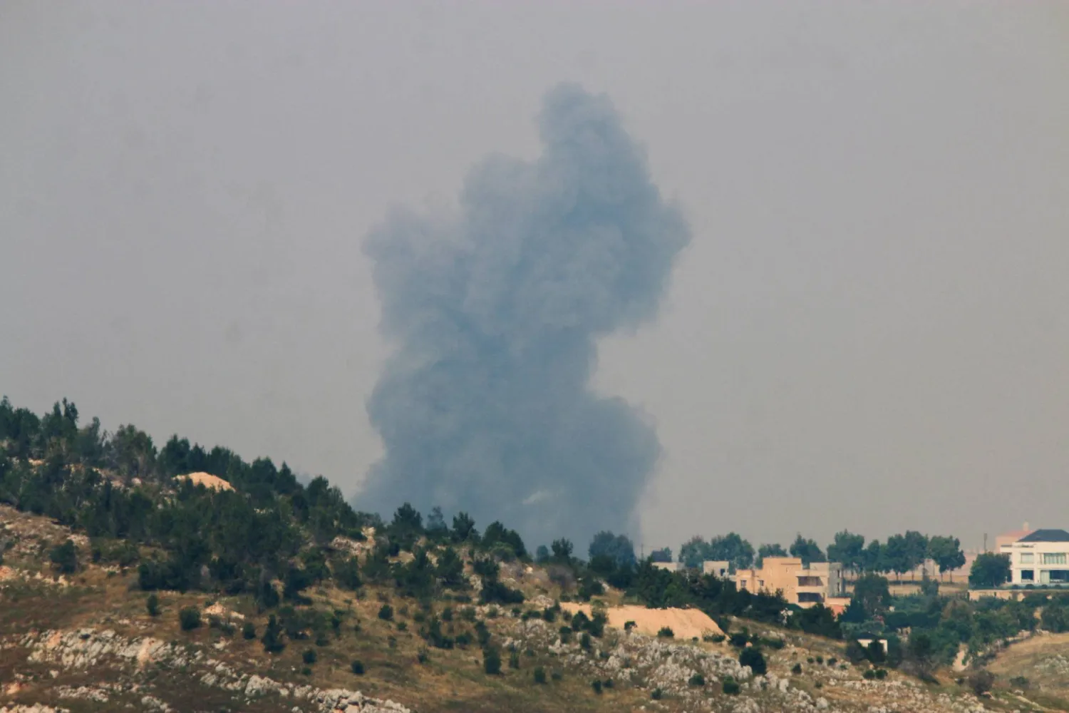 Smoke billows from southern Lebanon following strikes, as seen from Marjayoun, southern Lebanon, May 27, 2026. REUTERS/Stringer
