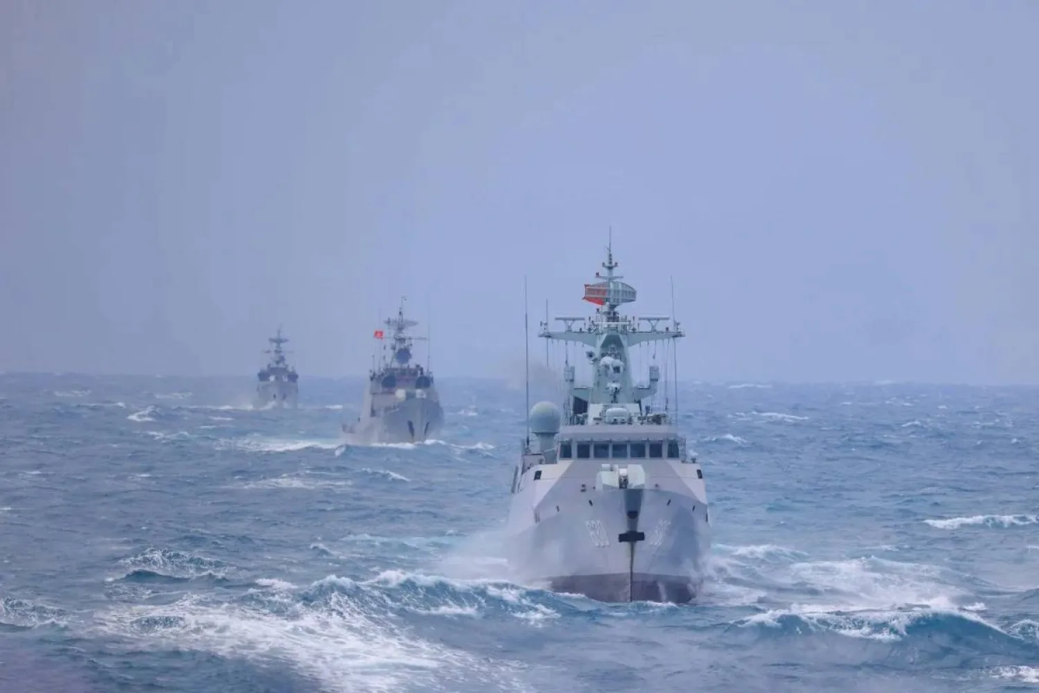 Vessels from Chinese and Vietnamese navies take part in a joint patrol in the Gulf of Tonkin in November last year. (Xinhua) 