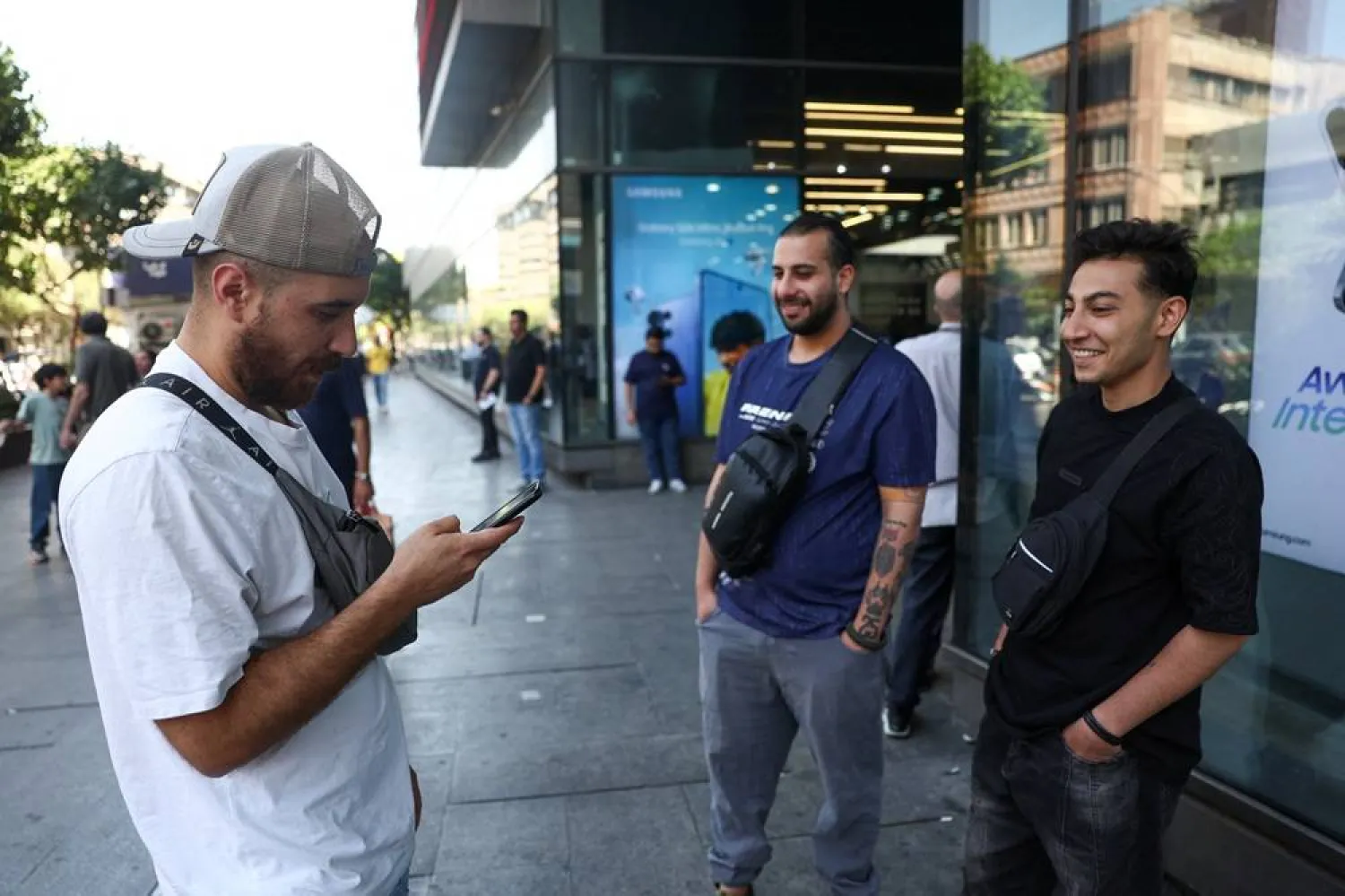 An Iranian man uses his phone, after a reported reopening of international internet access, in Tehran, Iran, May 27, 2026. Majid Asgaripour/WANA (West Asia News Agency) via Reuters