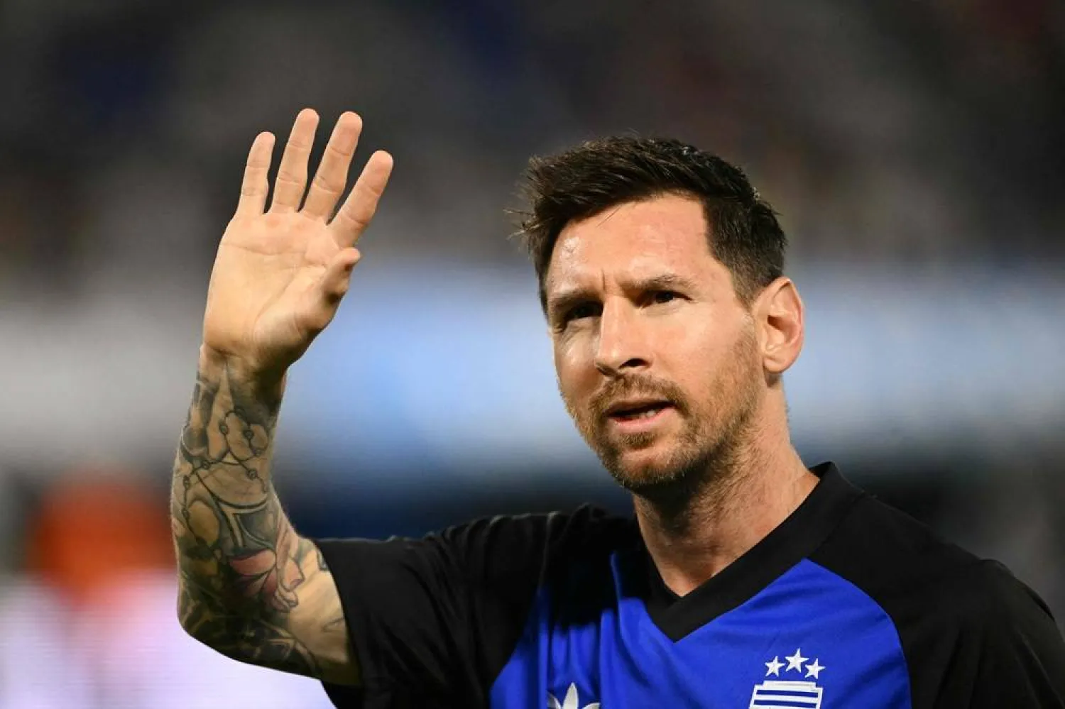 Argentina's forward #10 Lionel Messi waves to supporters as he warms up ahead of a friendly football match between Argentina and Zambia at La Bombonera stadium in Buenos Aires on March 31, 2026. (AFP)
