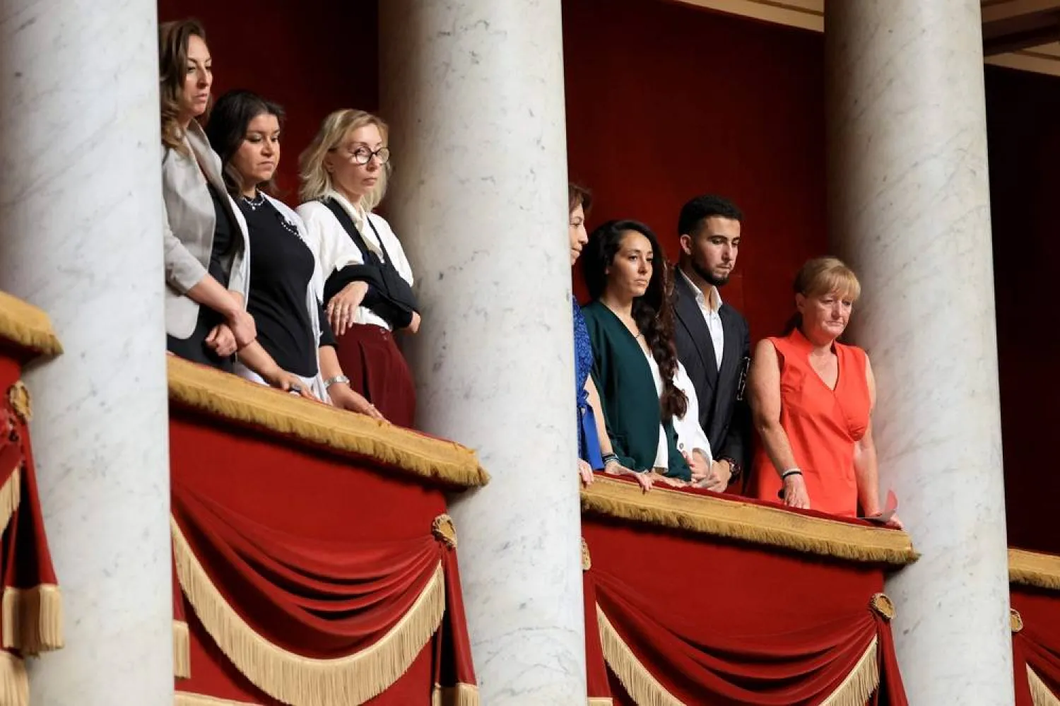 Members of the Gaza-bound humanitarian flotilla seized by Israeli soldiers attend a session of questions to the government at the National Assembly, France's Parliament lower house, in Paris on May 26, 2026. (AFP)