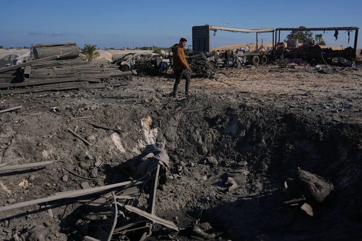 A Palestinian inspects the site of an Israeli strike in Khan Younis, southern Gaza Strip, Friday, May 29, 2026. (AP)