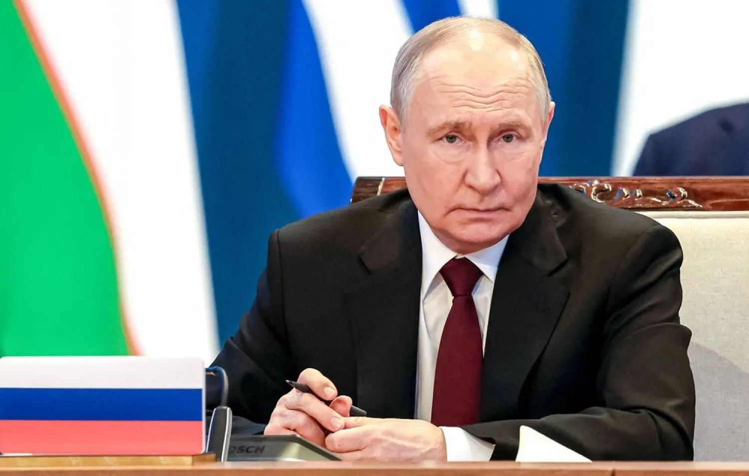 In this pool photograph distributed by the Russian state agency Sputnik Russia's President Vladimir Putin attends the extended-format meeting of the Supreme Eurasian Economic Council of the Eurasian Economic Union (EAEU) at the Palace of Independence in Astana on May 29, 2026. (AFP) 