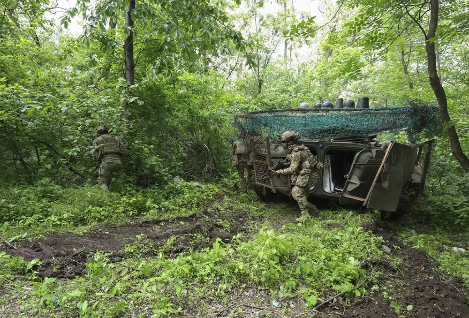 Servicemen of the 13th Khartiia Brigade of the National Guard of Ukraine take part in a tactical training exercise on a shooting range at an undisclosed location in the Kharkiv region, northeastern Ukraine, 29 May 2026, amid the Russian invasion. (EPA)