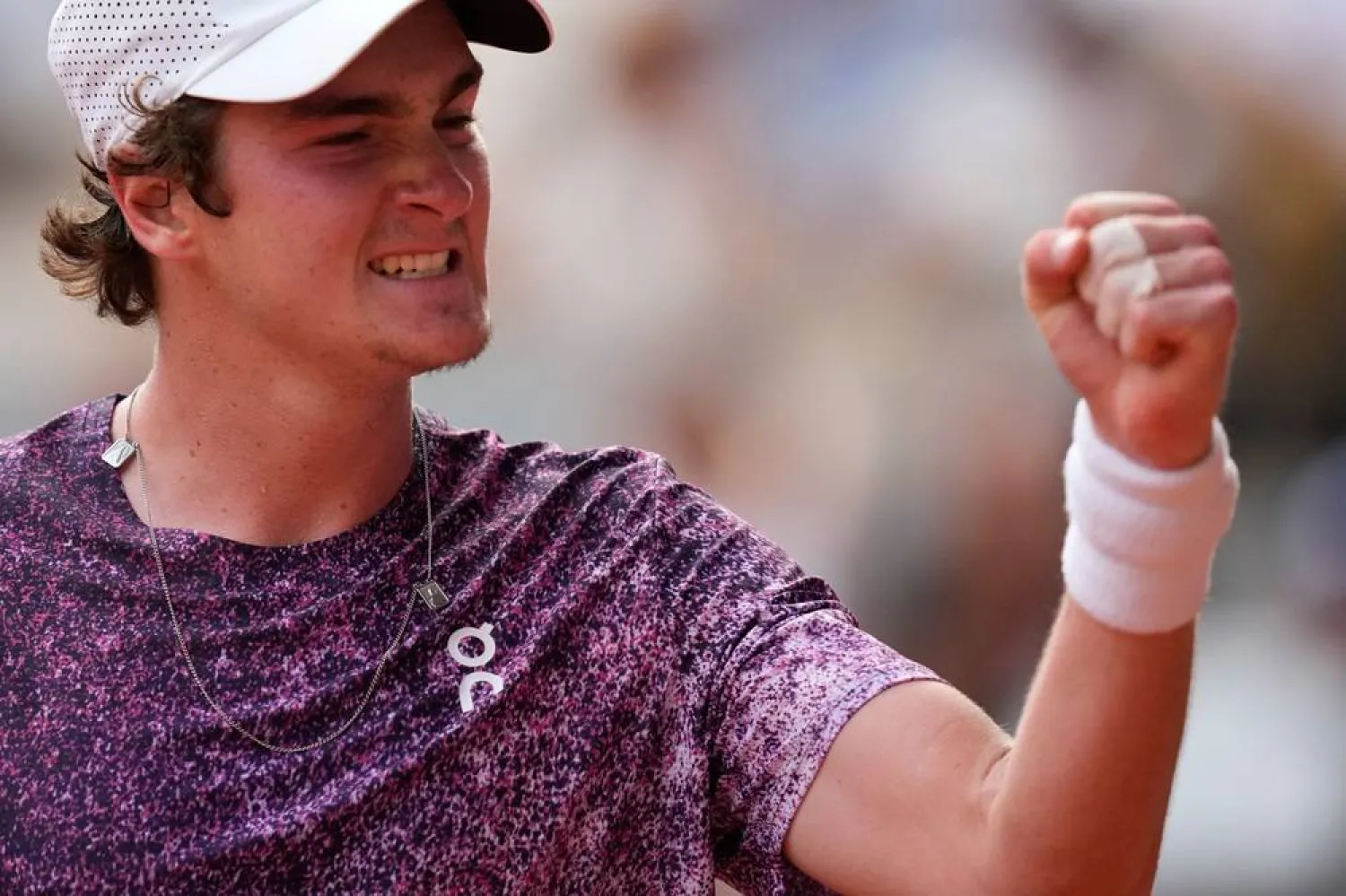 Joao Fonseca of Brazil reacts as he plays against Novak Djokovic of Serbia during their third round men's singles tennis match at the French Open tennis tournament in Paris, Friday, May 29, 2026. (AP) 