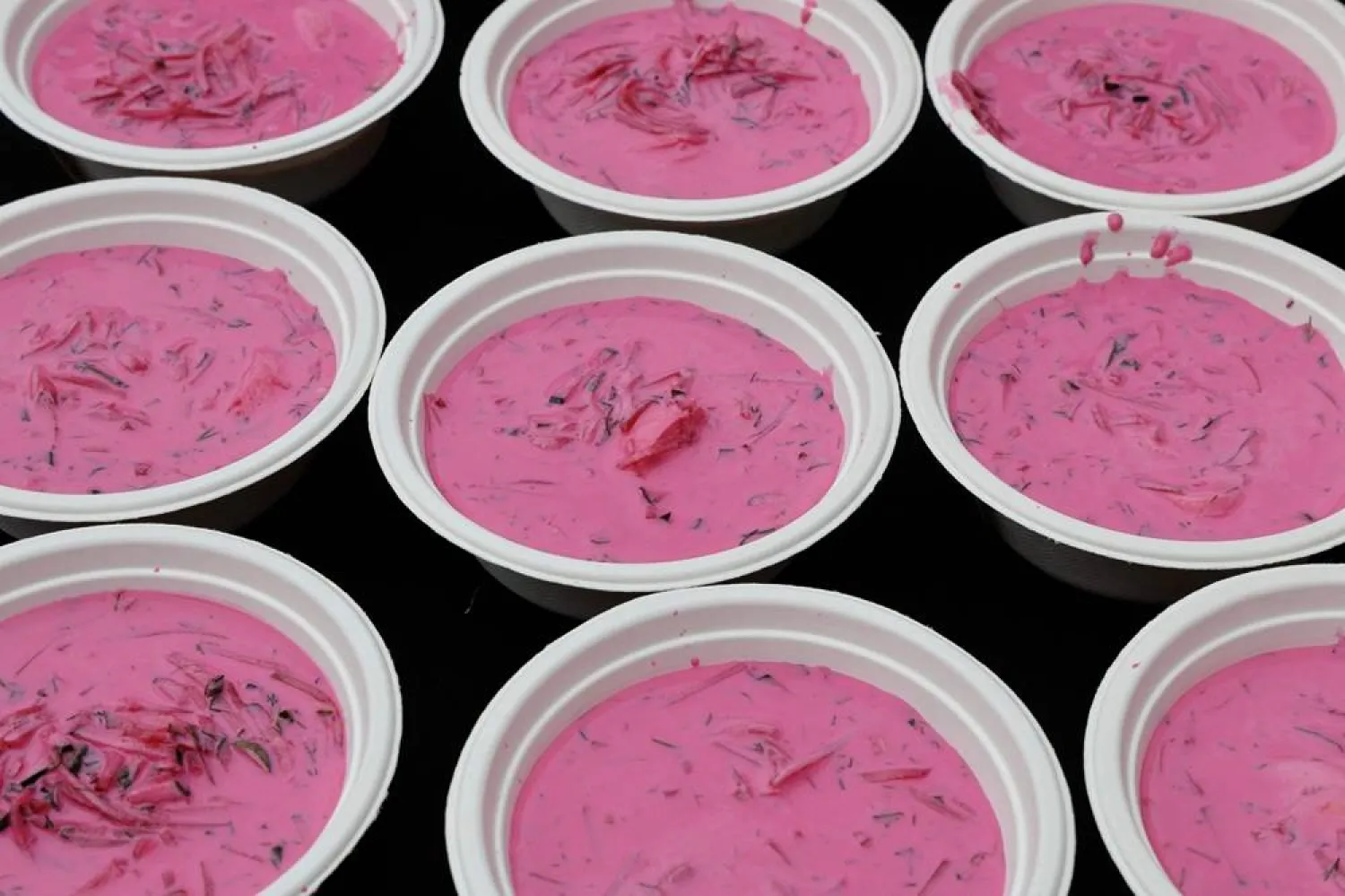 "Šaltibarščiai" beetroot soup is prepared during the Pink Soup Fest 2026, an annual event celebrating the in Vilnius, Lithuania, on May 30, 2026. (AFP)
