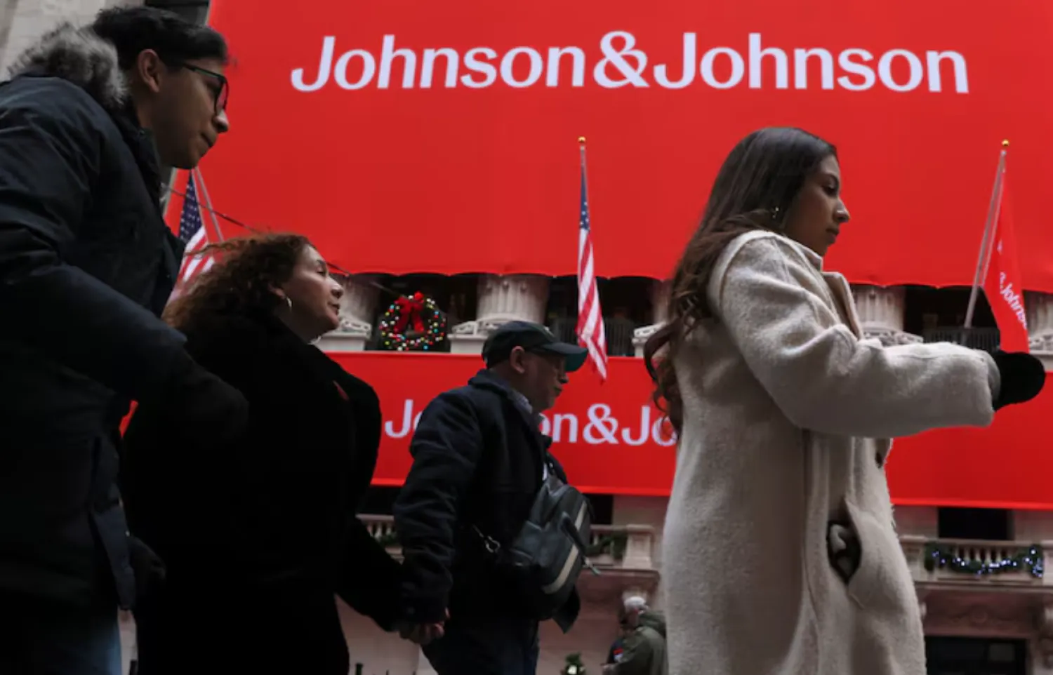 A Johnson & Johnson banner is displayed on the front of the New York Stock Exchange (NYSE) in New York City, in New York City, US, December 5, 2023. REUTERS/Brendan McDermid