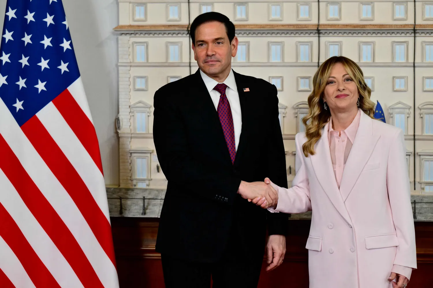 Italy's Prime Minister Giorgia Meloni welcomes US Secretary of State Marco Rubio at Palazzo Chigi in Rome on May 8, 2026. (AFP) 