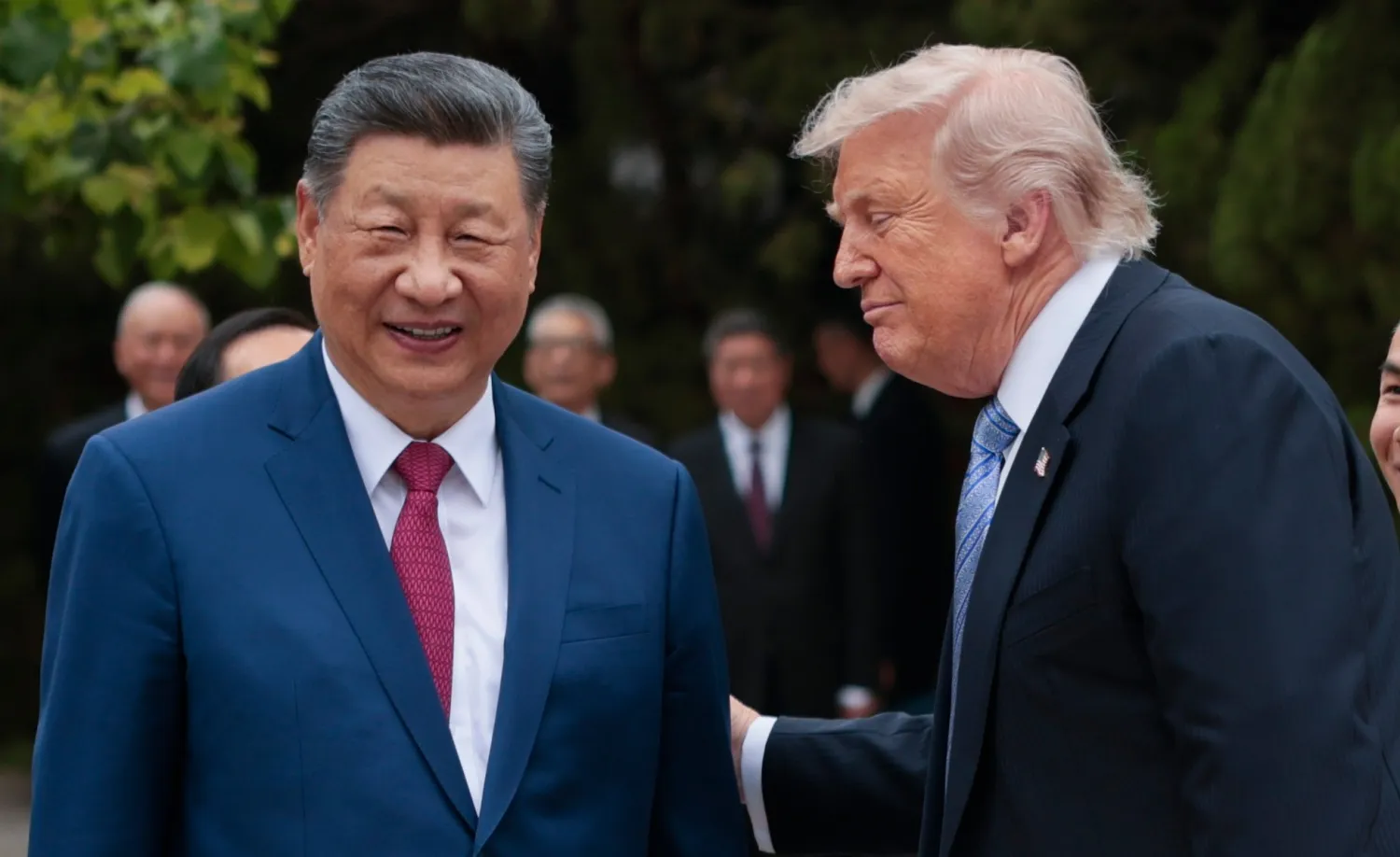 US President Donald Trump, right, speaks with Chinese President Xi Jinping while leaving after a visit to the Zhongnanhai Garden in Beijing, Friday, May 15, 2026. (Evan Vucci/Pool Photo via AP) 