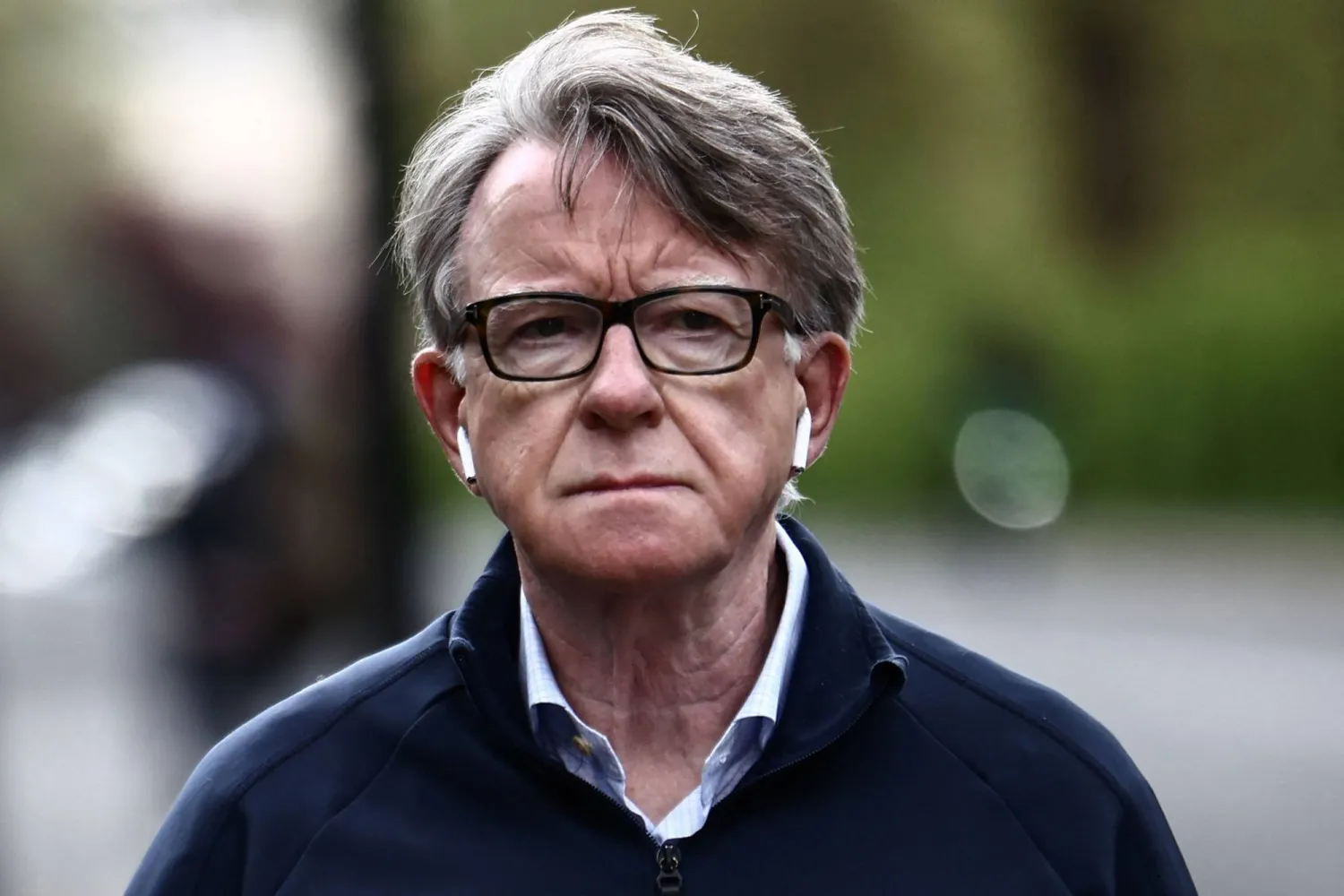 Former UK ambassador to the United States, Peter Mandelson, is pictured as he walks his dog near his residence in central London on April 20, 2026. (AFP)